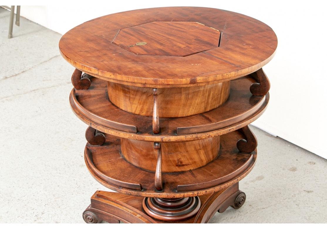 Antique Tiered Burled Mahogany Rotating Center Table with Cellerette In Good Condition For Sale In Bridgeport, CT
