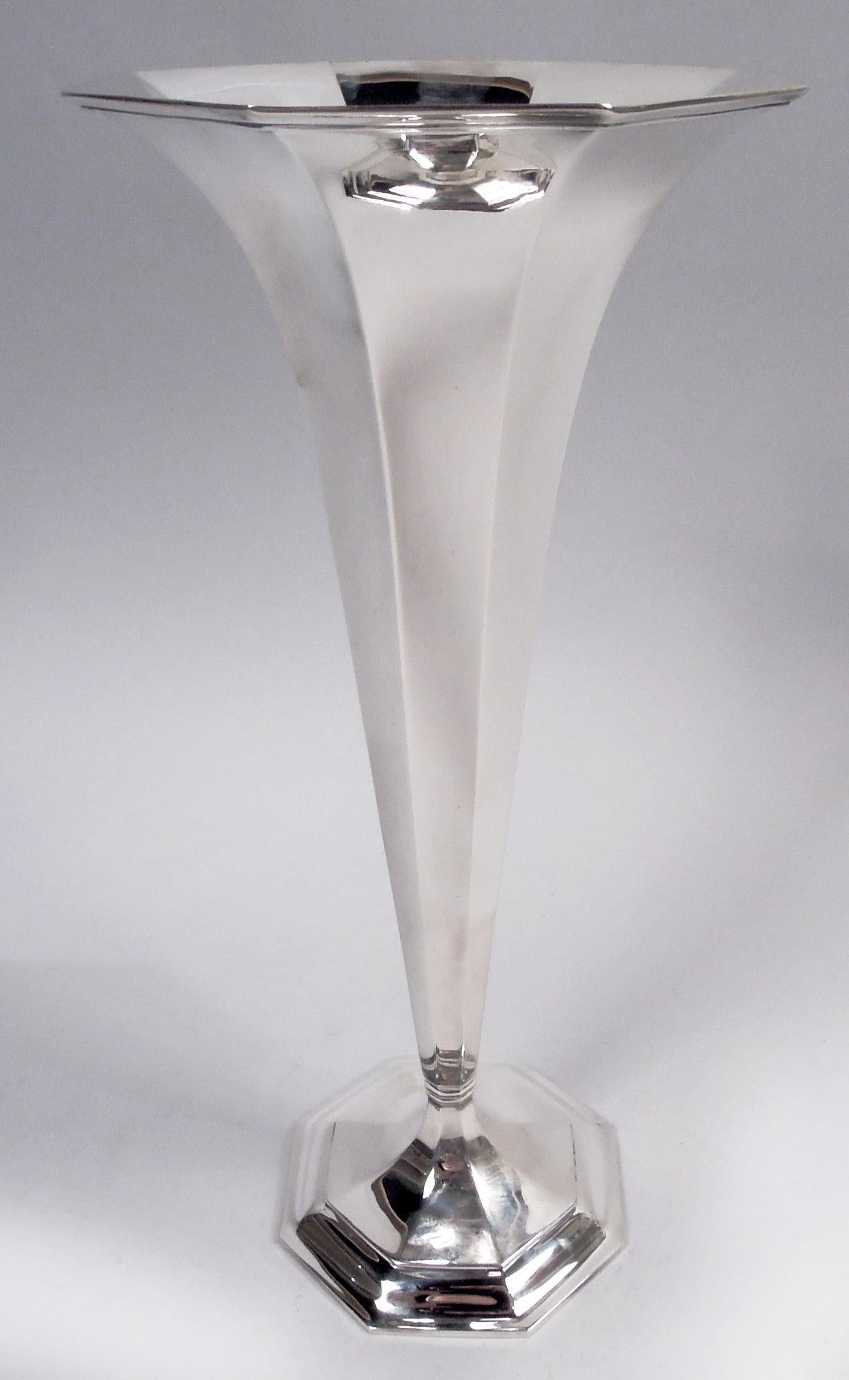 Art Deco sterling silver trumpet vase. Made by Tiffany & Co. in New York, ca 1912. Conical with flared mouth and raised foot. Faceted. An early design in the emerging geometric style. Fully marked including maker’s stamp, pattern no. 18377 (first