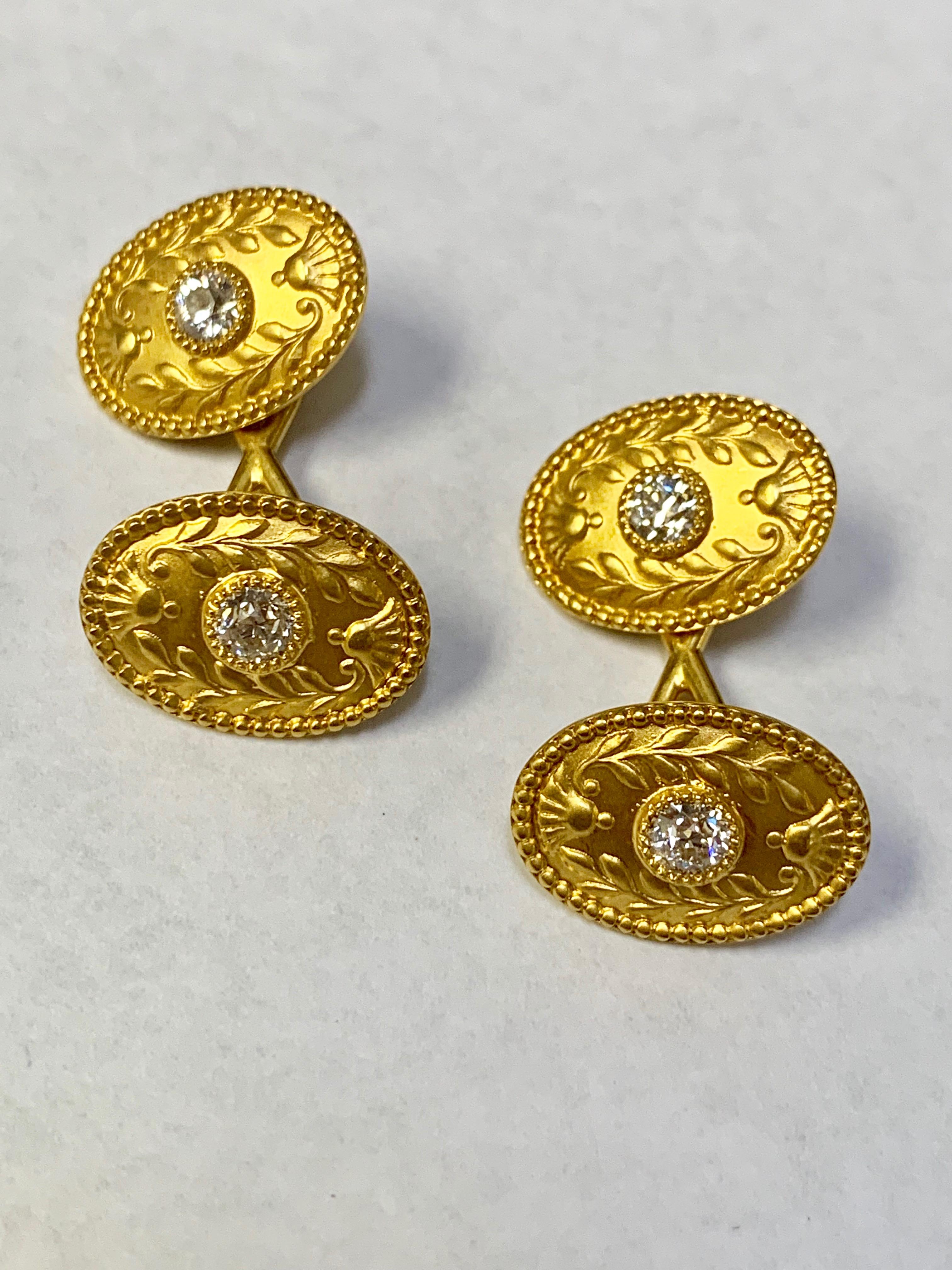 Antique Art Nouveau Tiffany & Co 18ky diamond oval shaped cufflinks.  Approximately 0.80 carat total weight of Old European cut diamonds G-H color and VS2-SI1 clarity.  Diamonds are bezel set with milgrain detailing.  Stamped 
