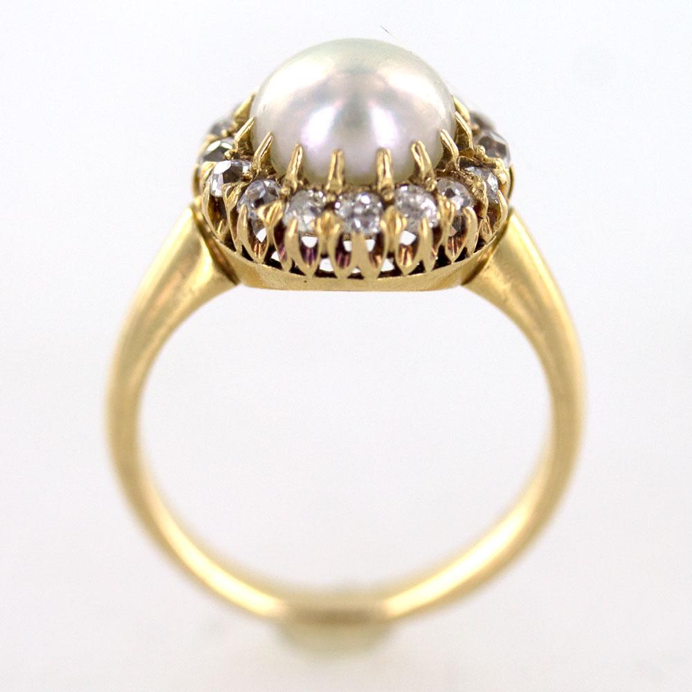 Beautiful Antique Tiffany & Company Diamond Pearl Ring circa early 1900's. Seventeen Old Mine Cut diamonds surround an 8.1mm freshwater natural white pearl. The pearl has been certified by the GIA. Crafted in 18 karat yellow gold, the ring is also