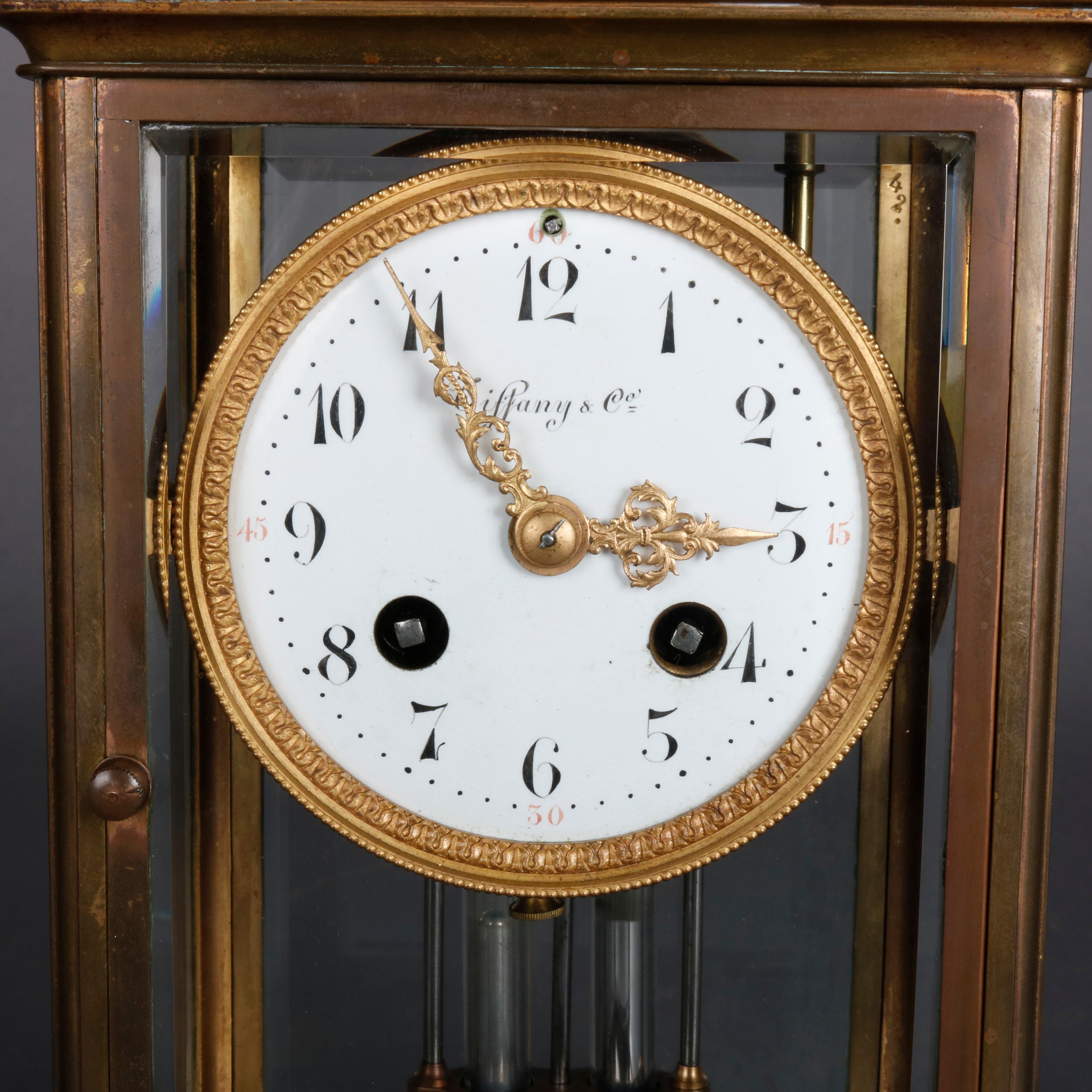 An antique regulator mantel clock by Tiffany & Co. offers brass frame with works house in beveled crystal case, face signed as photographed, circa 1890

***DELIVERY NOTICE – Due to COVID-19 we are employing NO-CONTACT PRACTICES in the transfer of