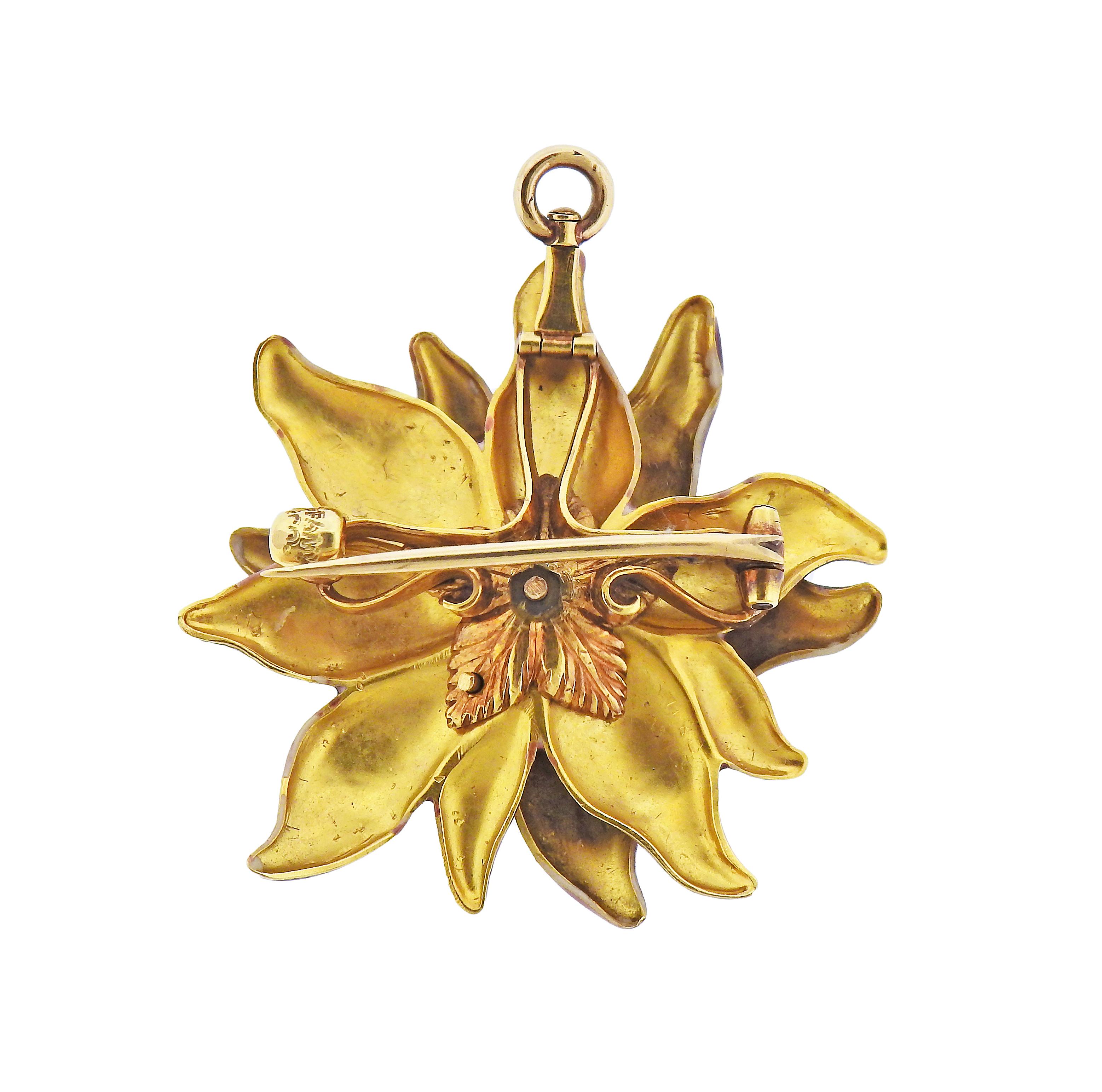 Antique Tiffany & Co 14k gold flower brooch, with 3.6mm pearl and enamel top. Brooch measures 32mm x 34mm. Marked Tiffany & Co. Weight - 9.6 grams.