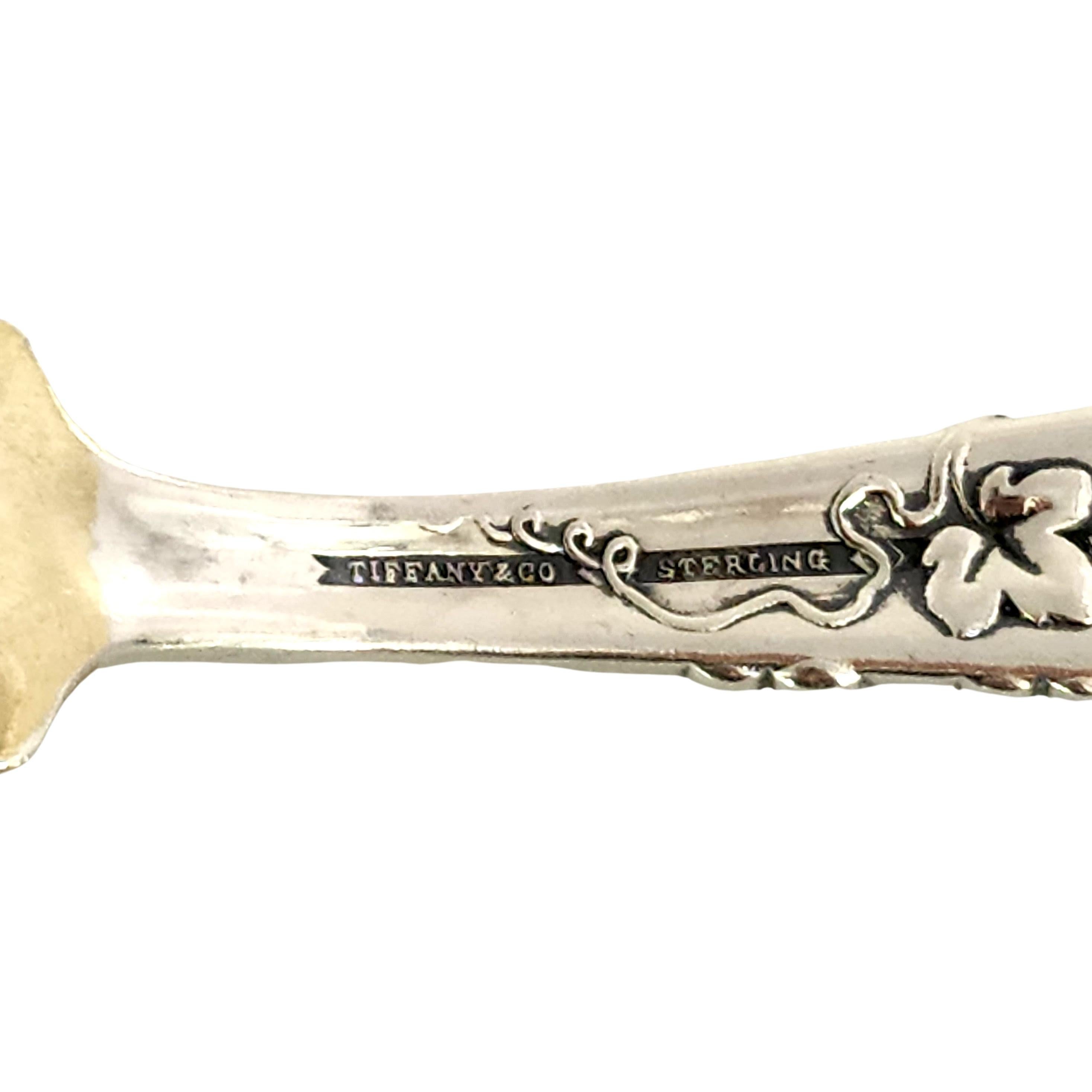 Antique sterling silver gold wash blade Ice Cream Hatchet Slicer by Tiffany & Co in the Grapevine pattern.

Monogram appears to be MW (on the back of the handle)

Tiffany's Grapevine pattern is one variation of the multi-motif Vine pattern. Features