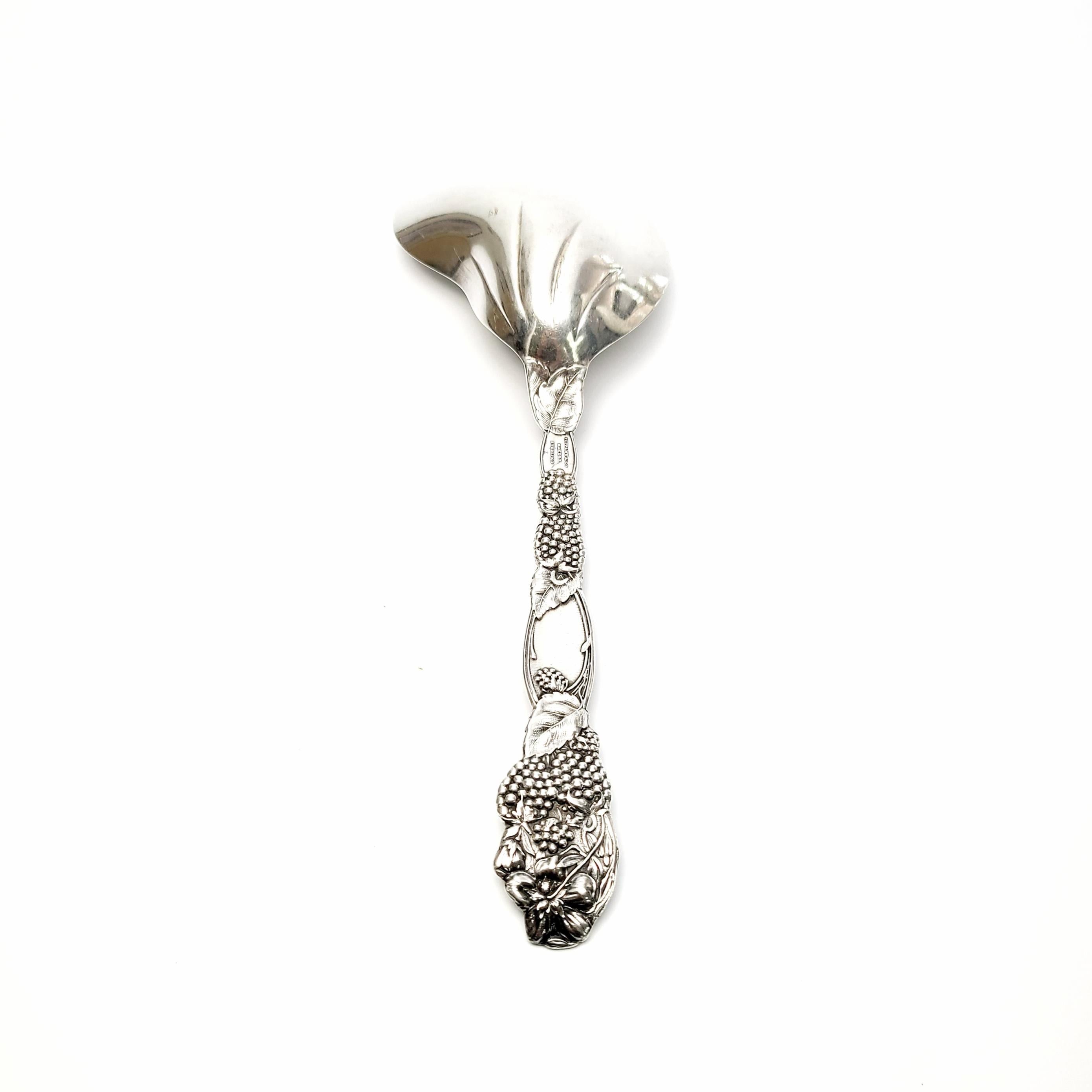Antique sterling silver berry casserole spoon by Tiffany & Co. in the blackberry pattern.

Monogram appears to be MFA

Tiffany's Blackberry pattern was introduced in 1875. This spoon features the blackberry pattern handle with a kidney shaped