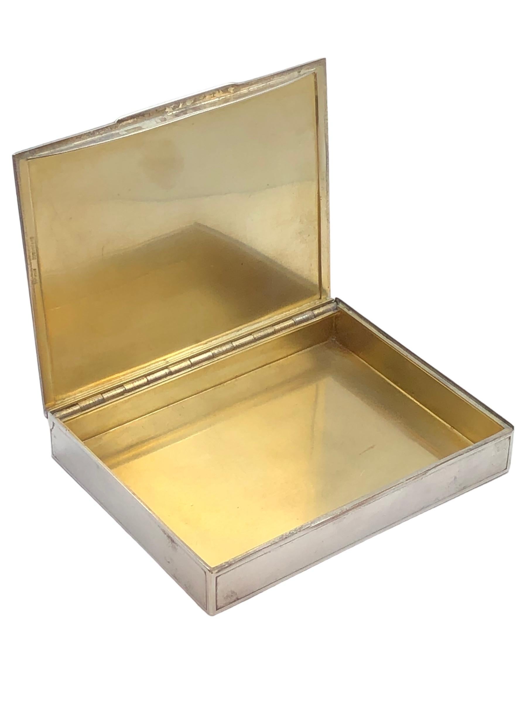 Circa 1920s Tiffany & Company Sterling Silver Table Trinket Box, measuring 3 5/8  X  2 7/8 inches x 1/2 inch deep, Gold wash interior. 