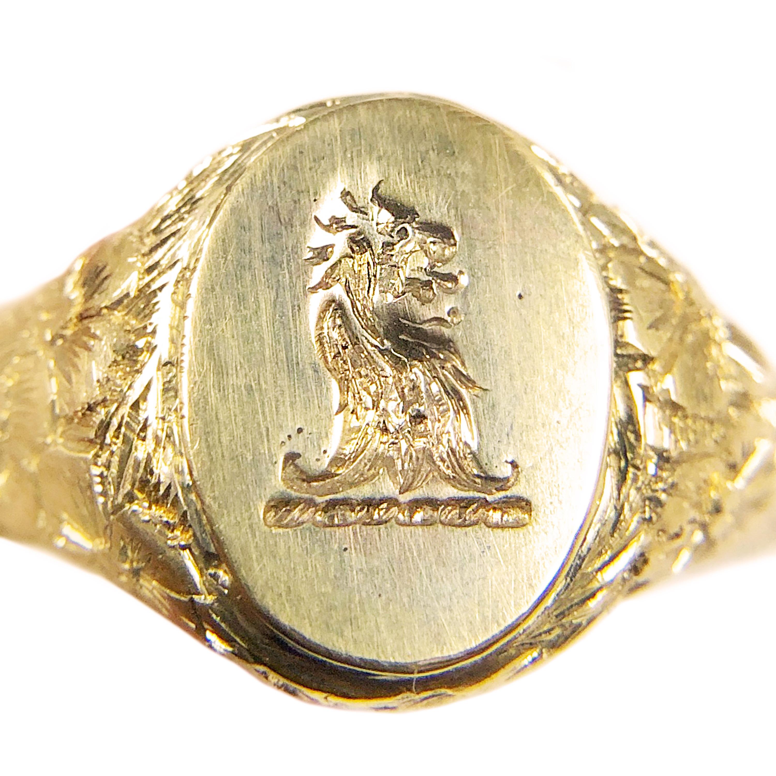 Tiffany & Company dated 1901 14K Yellow Gold Signet Ring. A heavy solid ring weighing 15 Grams with deep crisp hand chasing. The top of the ring with an intaglio signet measures 1/2 x 1/2 inch. Excellent condition overall and is a finger size 9 1/2. 
