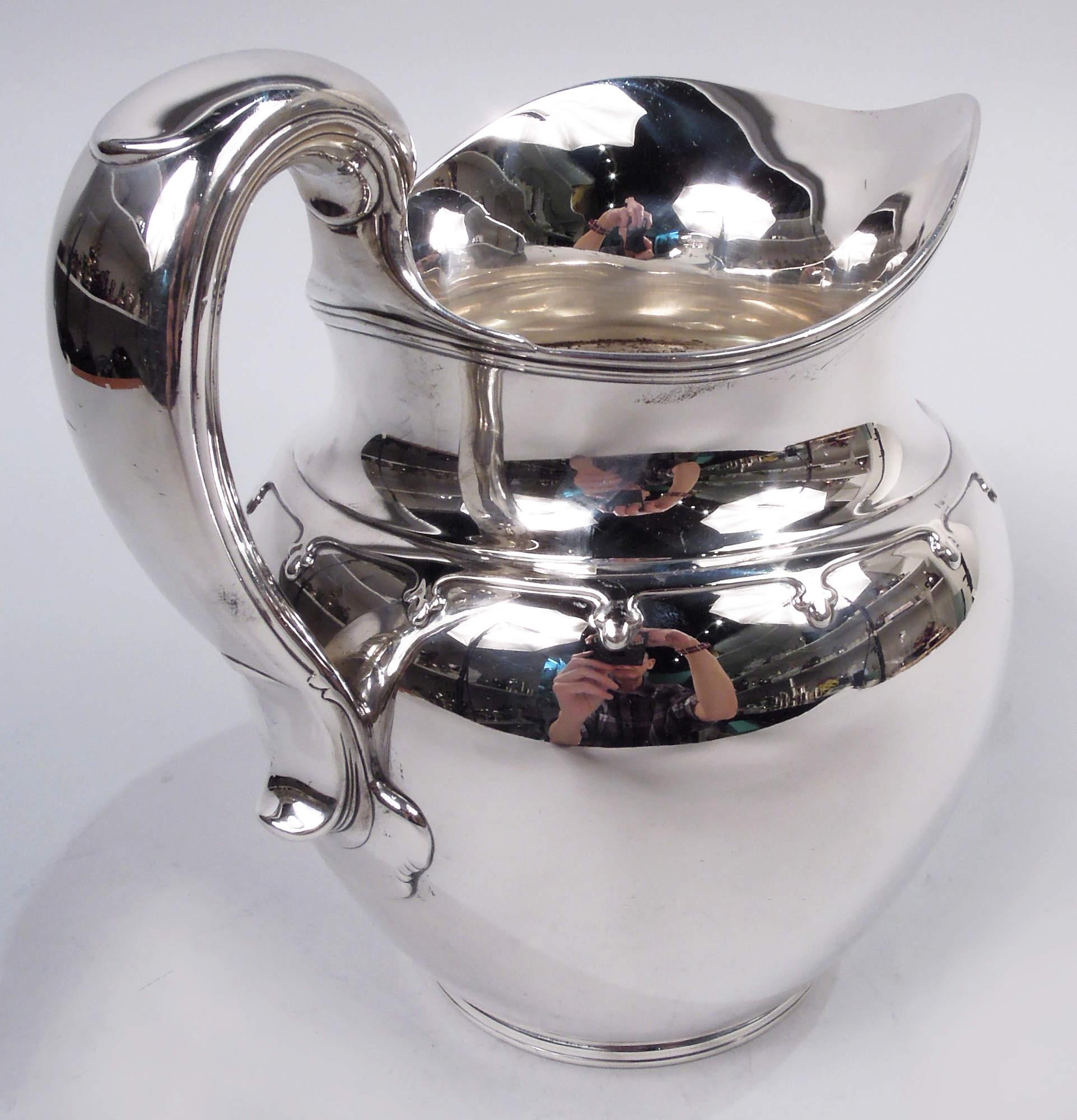 20th Century Antique Tiffany Saint Dunstan Sterling Silver Water Pitcher For Sale