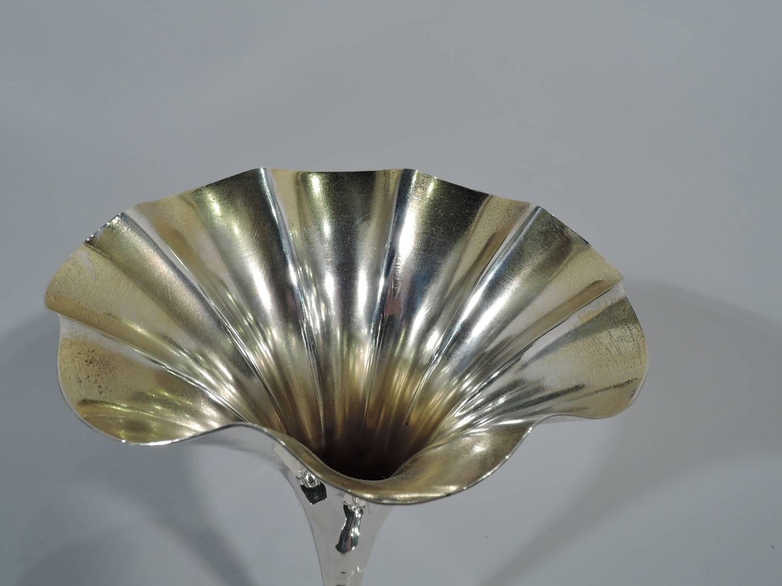 Fancy sterling silver vase. Made by Tiffany & Co. in New York, circa 1910. Elongated cone on small dome set in flat circular foot. Chased gadroons and applied beads. Interior lightly gilt. Hallmark includes pattern no. 11908 and director’s letter m