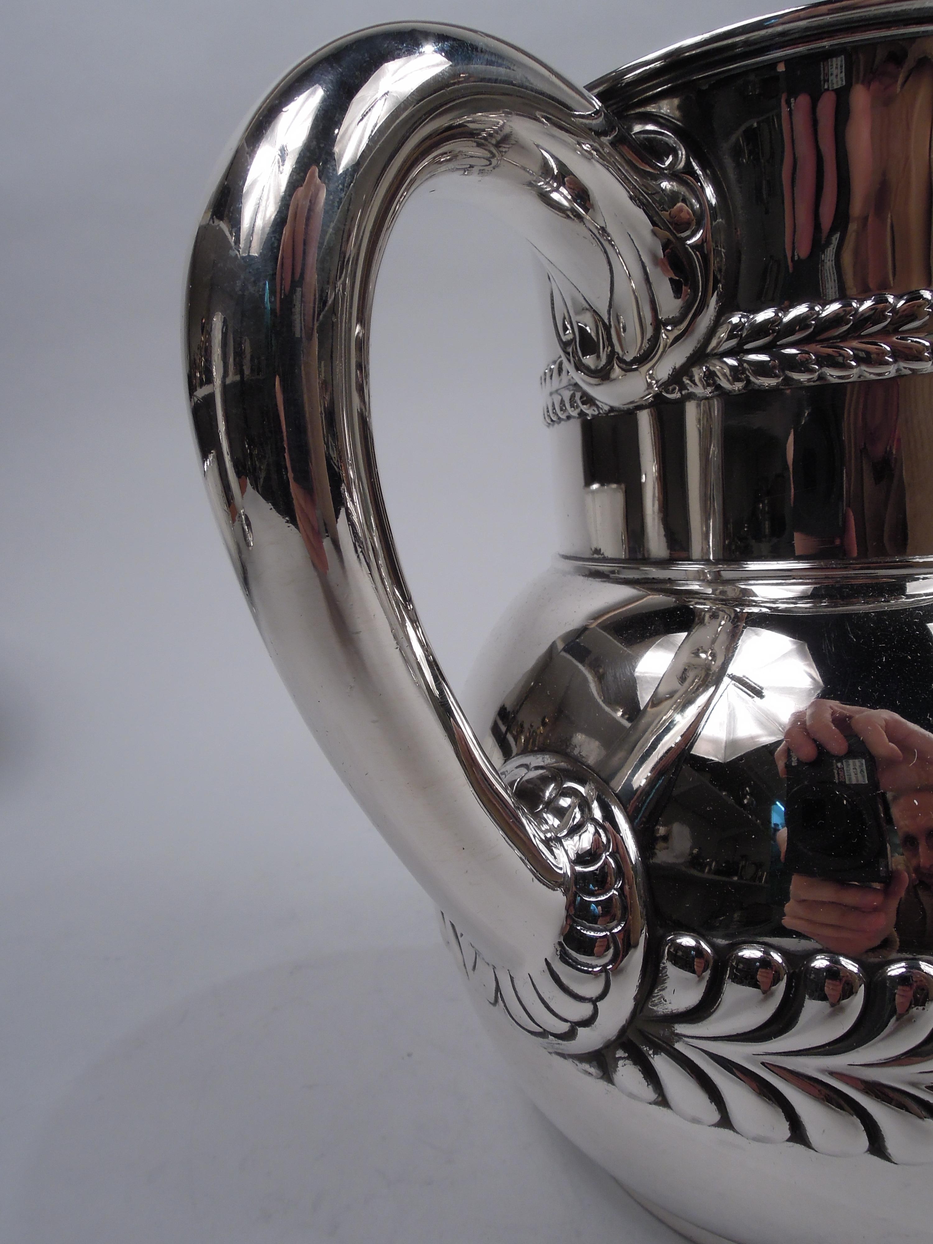 American Antique Tiffany Sterling Silver Pitcher with Bold Wave Edge Borders For Sale