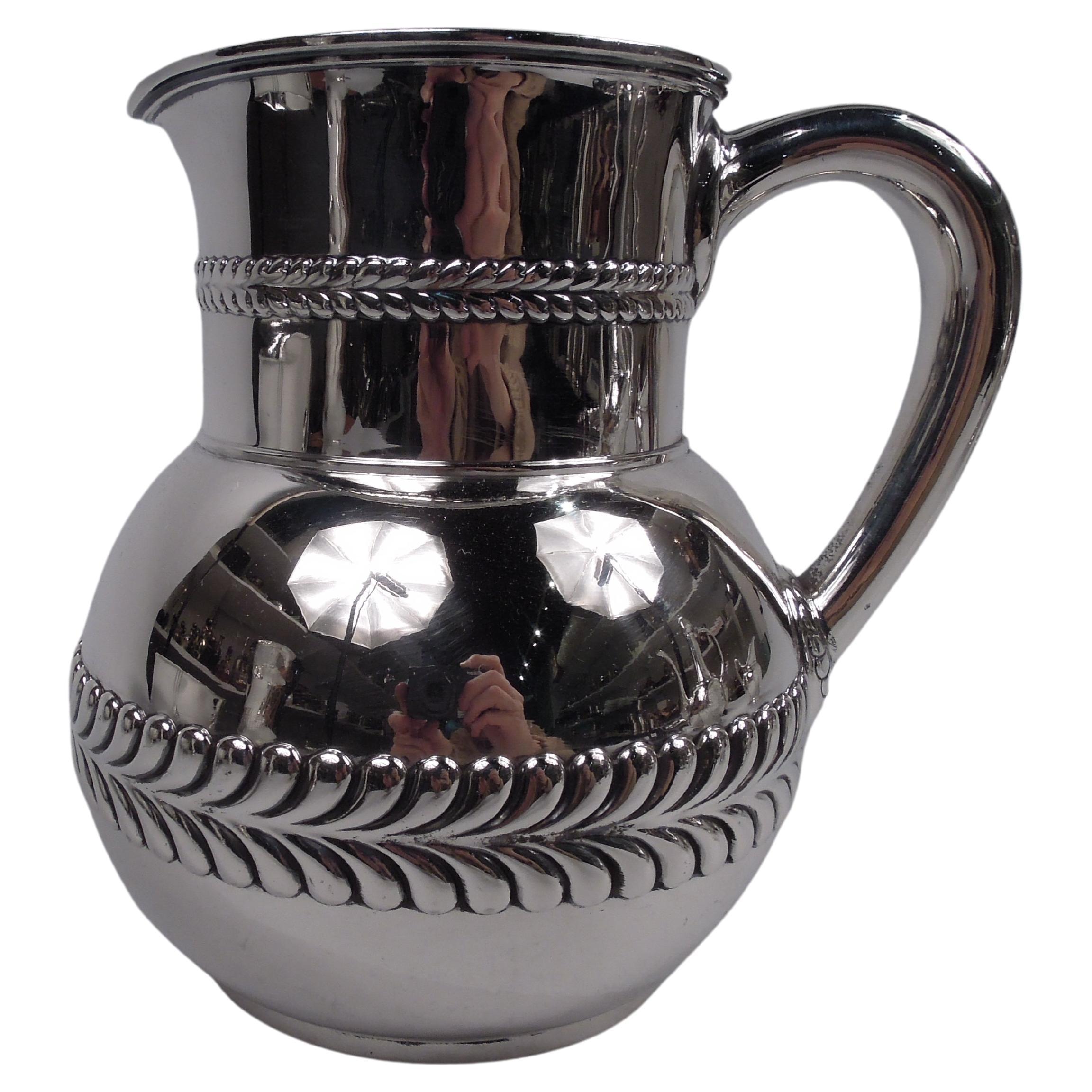 Antique Tiffany Sterling Silver Pitcher with Bold Wave Edge Borders For Sale