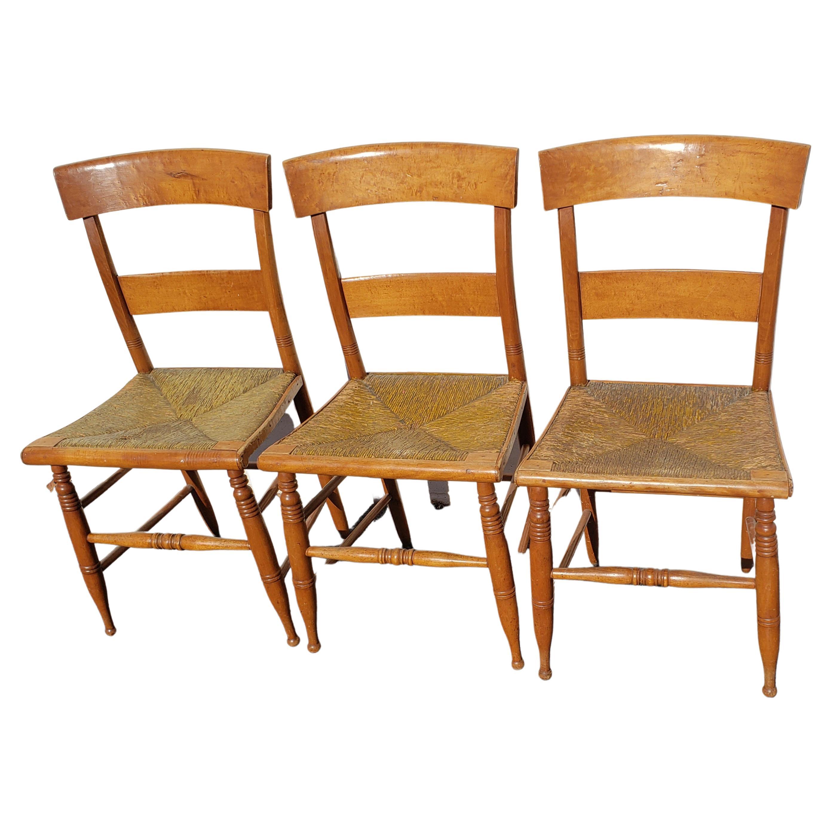 Mid 19th century bentwood slat back Tiger maple rush seat yellow paint dining chairs.
 Details: Woven rush seats, with old yellow paint, solid wood frame, very nice antique item, quality American craftsmanship.
Measurements: 33