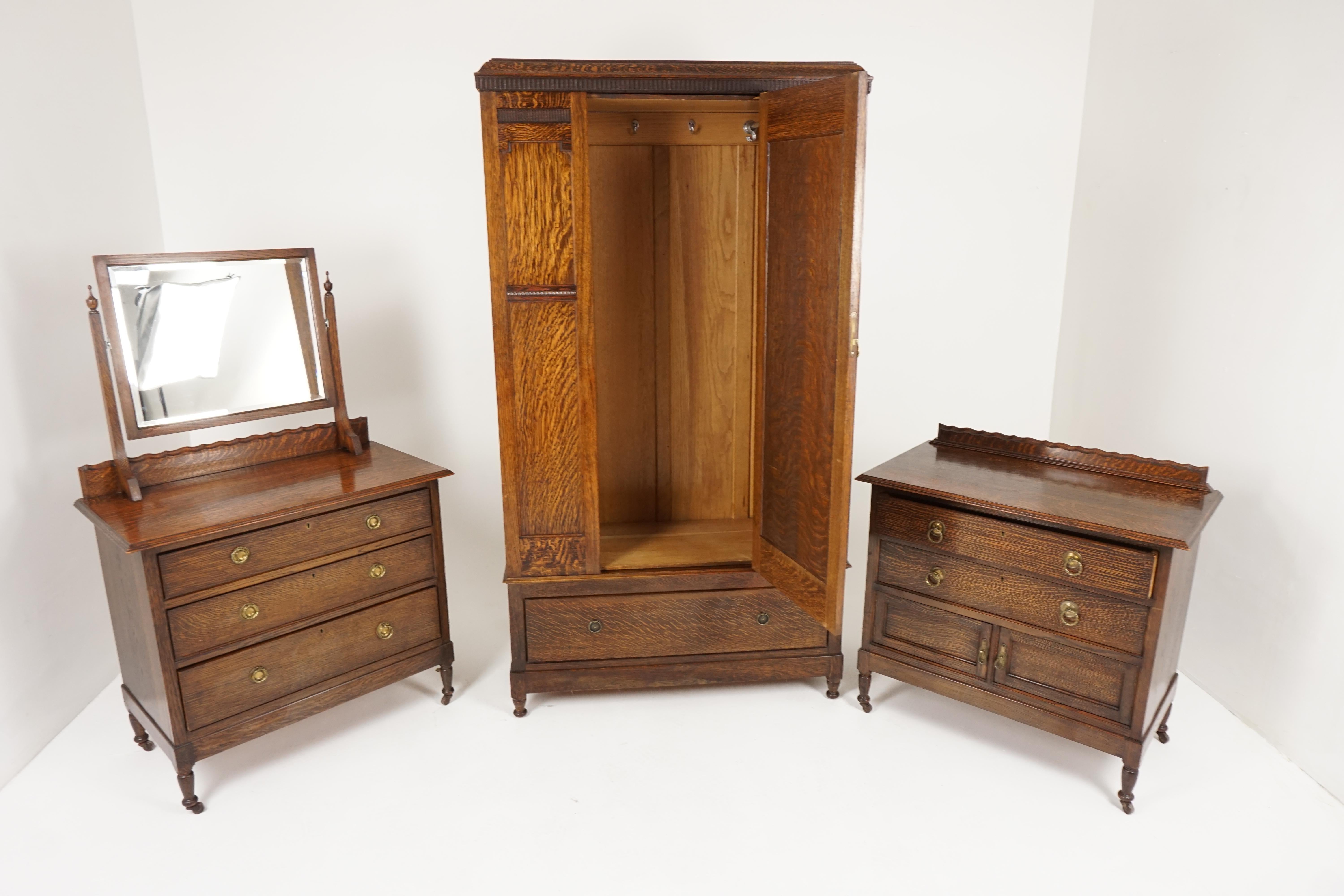 Antique tiger oak 3-piece bedroom suite armoire vanity dresser Scotland 1910, B2184

Scotland 1910
Solid tiger oak
Original finish
Armoire with carved cornice on top
Single beveled glass mirror door opens to reveal pair of hanging
