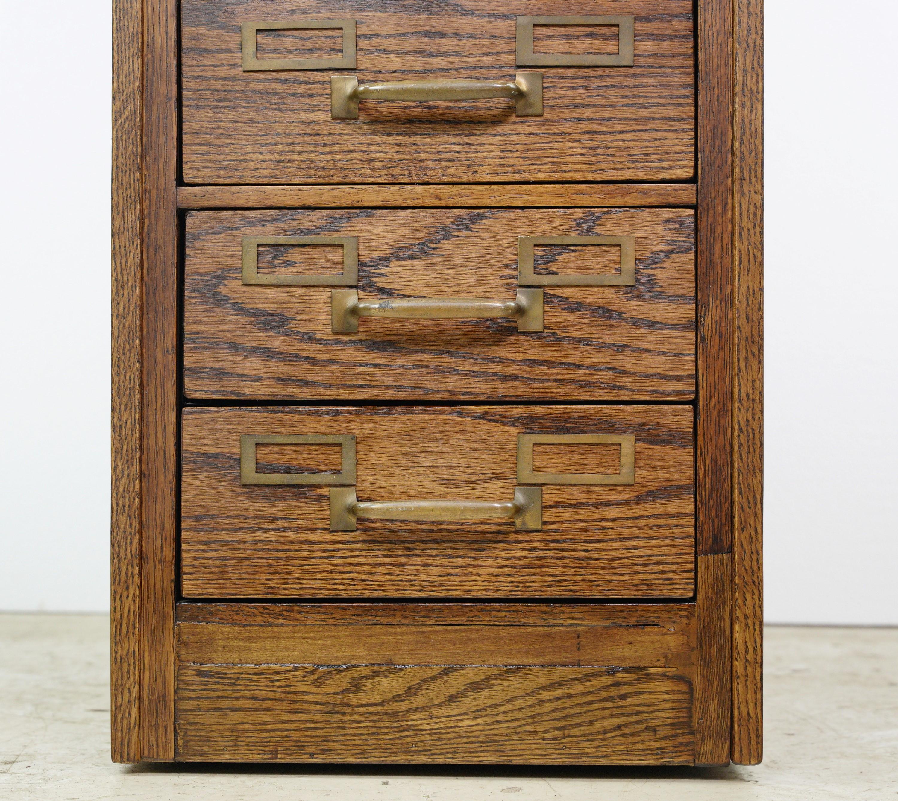 Antique Tiger Oak 6 Steel Drawer Filing Cabinet with Brass Hardware In Good Condition For Sale In New York, NY