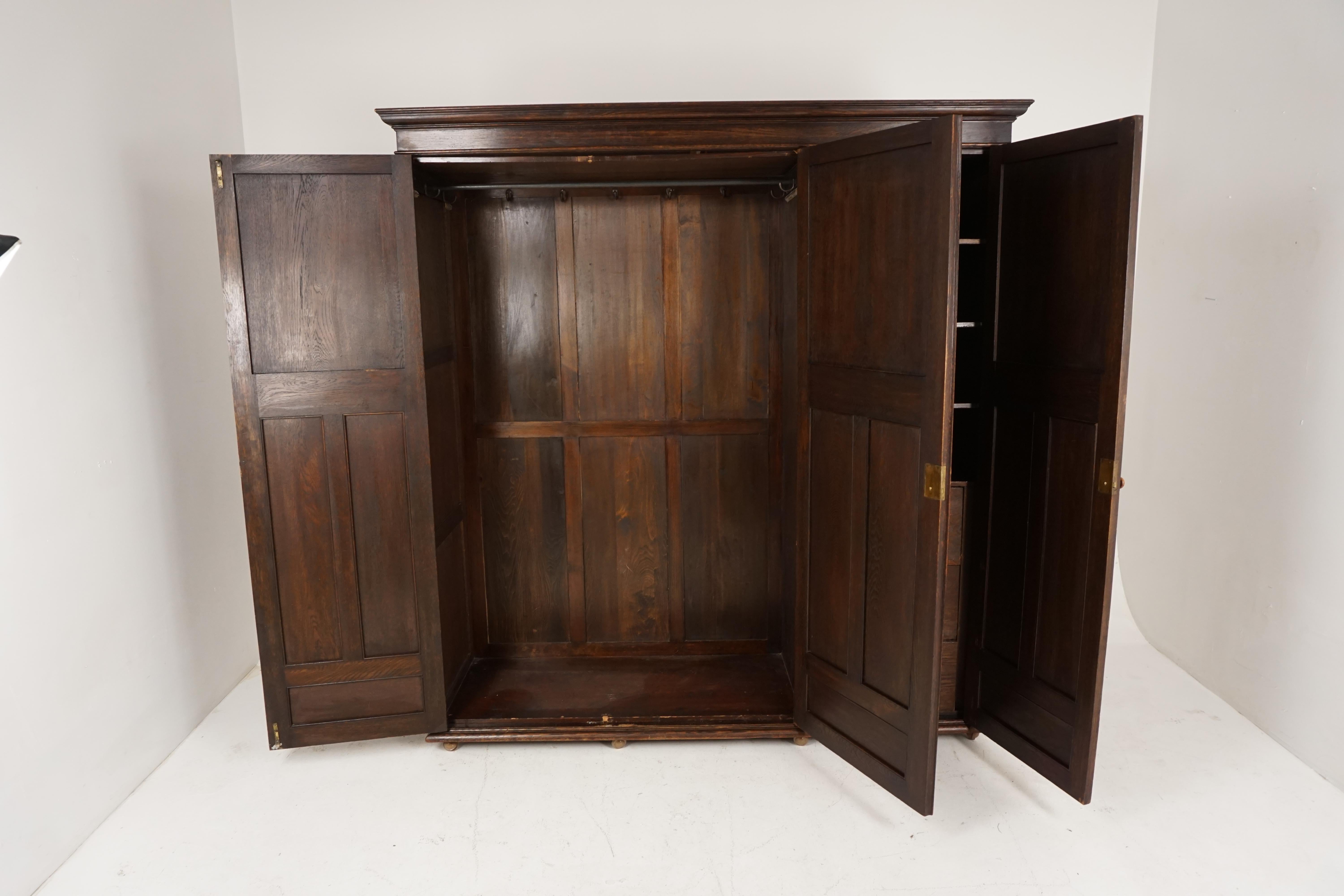 Antique tiger oak compactum armoire, carved wardrobe, closet, Scotland 1910, B2398

Scotland 1910
Solid oak
Original finish
Moulded cornice above
Three geometric carved paneled doors
Opens to reveal large hanging area to one side
The other