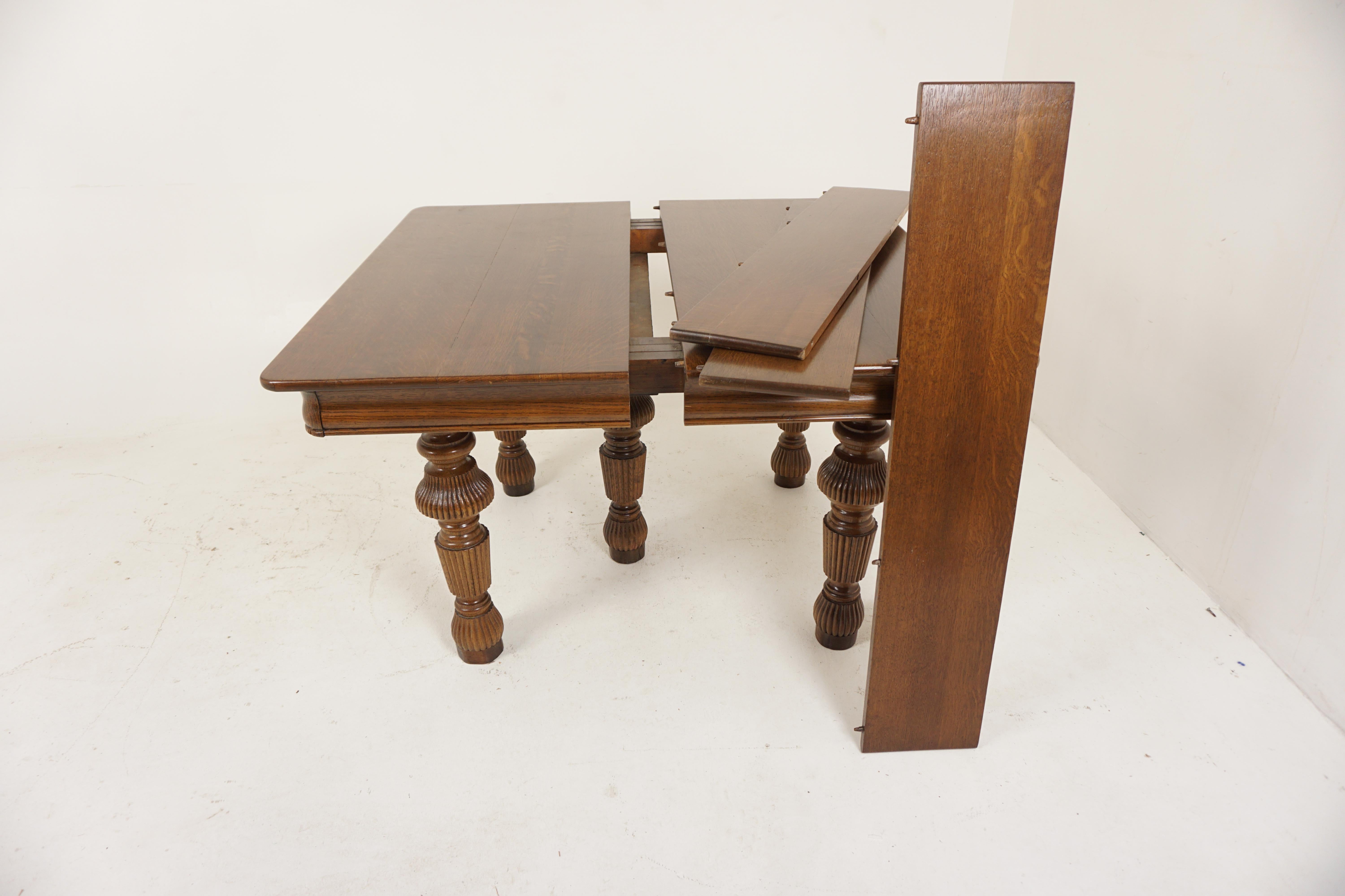 Table de salle à manger ancienne en chêne tigré, 3 rallonges, 5 pieds, américaine, 1910, H691 en vente 1