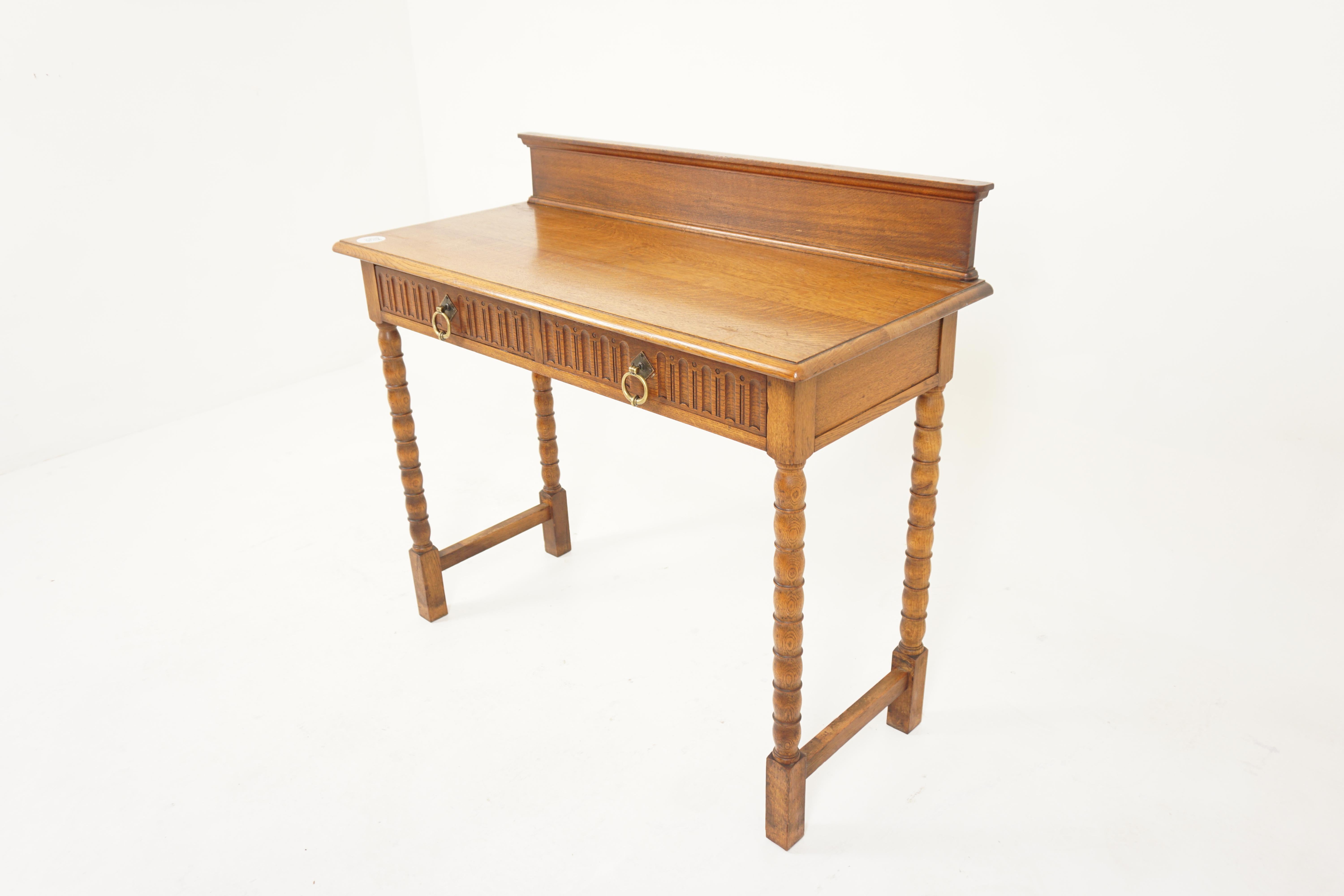 Antique Tiger Oak hall table, Server, sofa table, Scotland 1910, H803

Scotland 1910
Solid Tiger Oak
Original Finish
High gallery back
Rectangular moulded top
Pair of dovetailed drawers with original brass pulls.
All standing on four tall