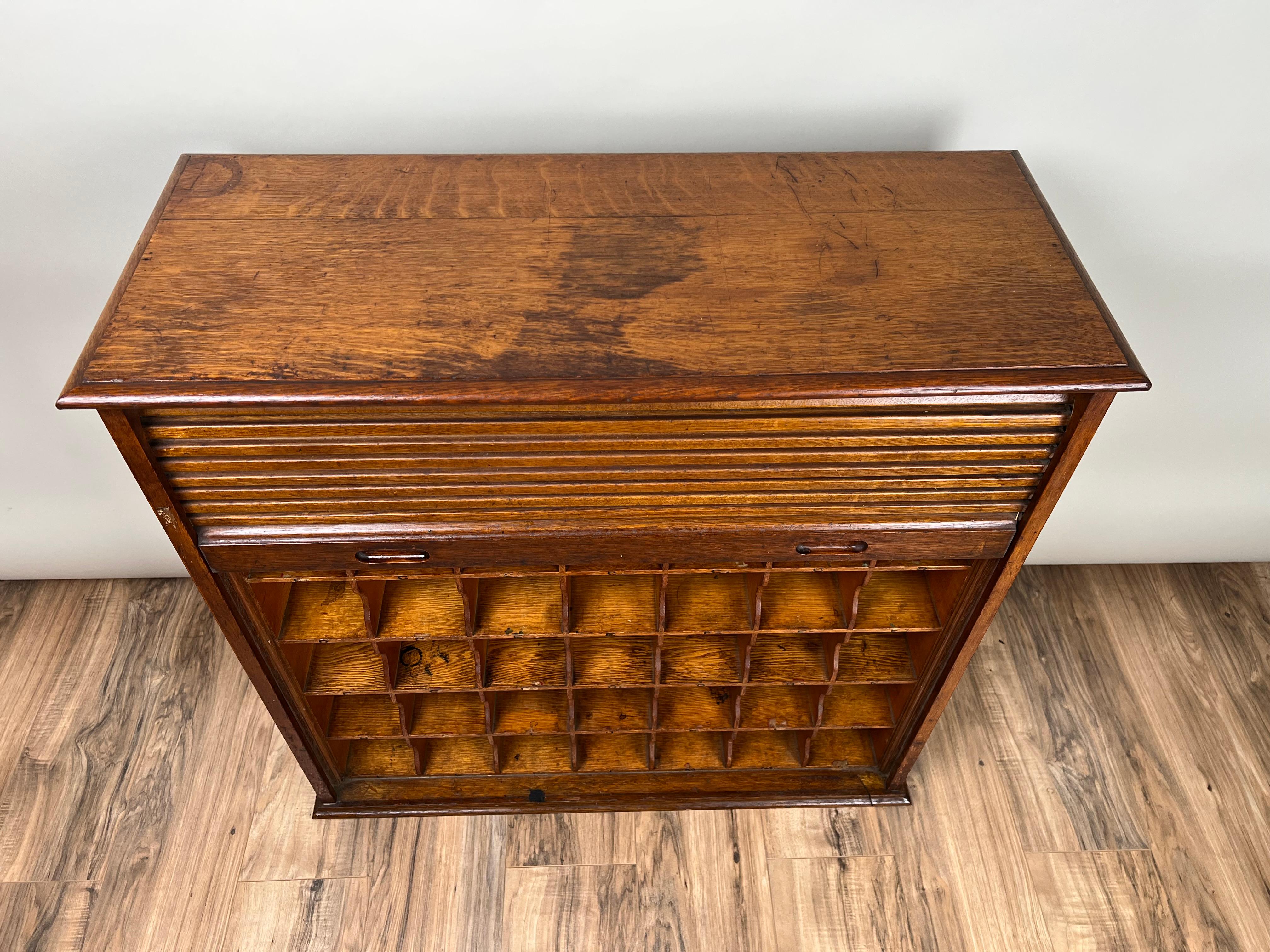 Antique Tiger Oak Roll Top Pigeon Hole Cabinet c. 1920 In Good Condition For Sale In Westfield, MA