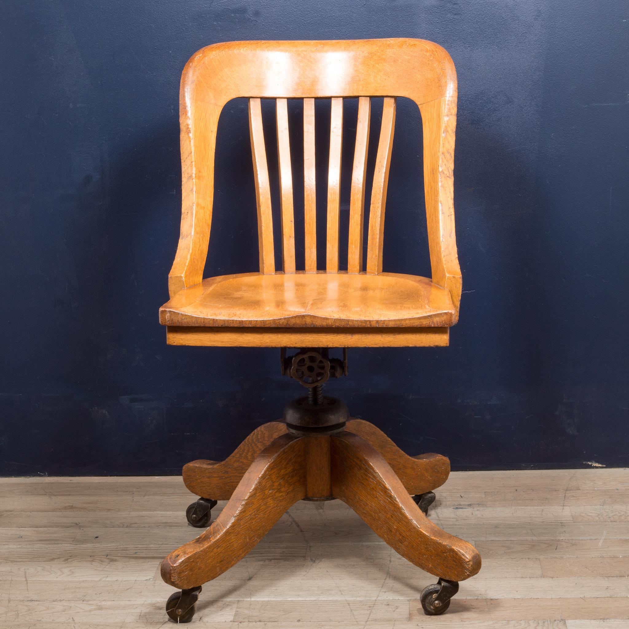 About

This is an original solid tiger oak desk chair with cast iron mechanism, casters and original maker's metal tag. This chair swivels, tilts back and the height is adjustable. This chair has retained its original finish and has minor