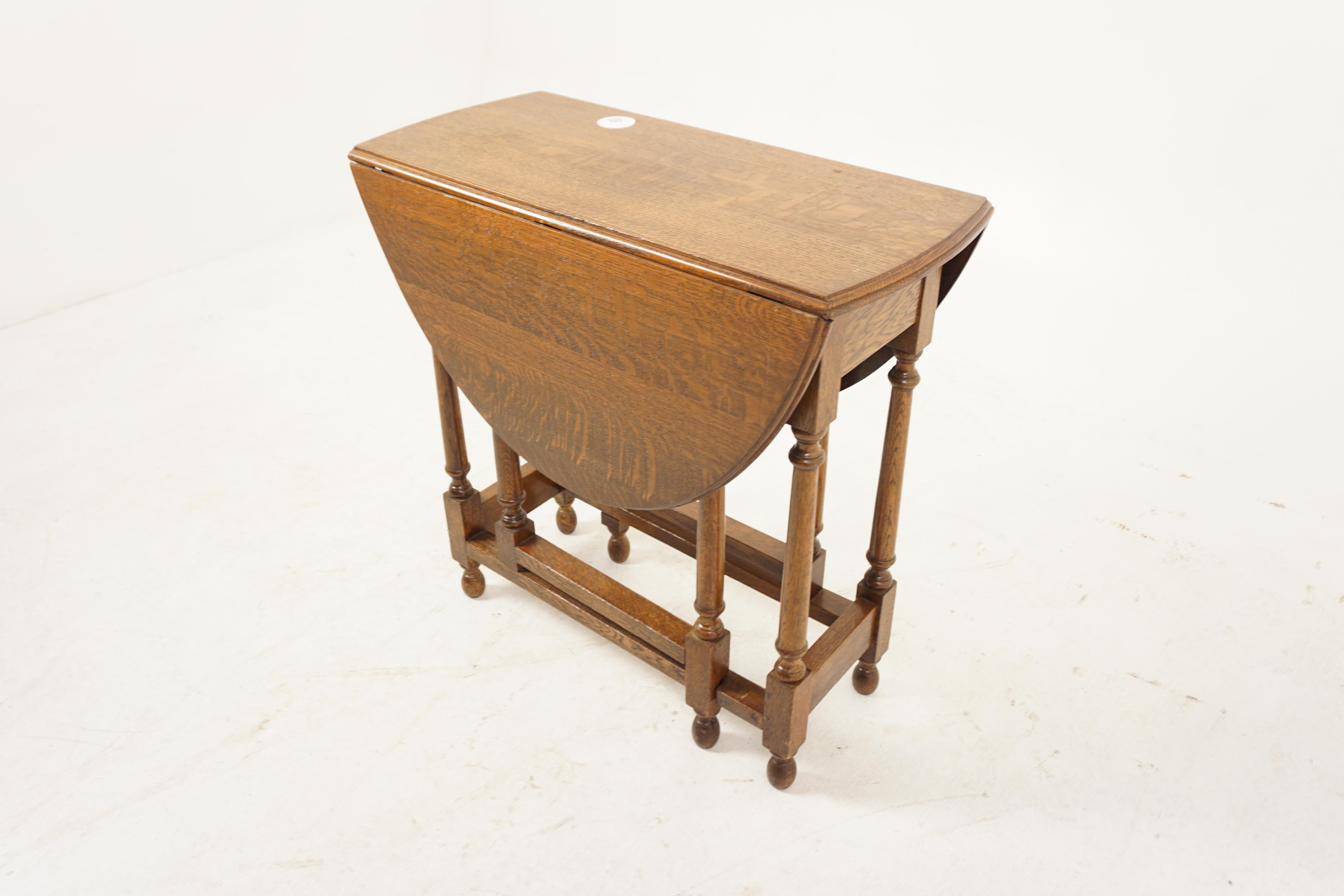 Antique Oak Table, Small Tiger Oak Gateleg Drop Leaf End Table, Antique Furniture, Scotland 1930, H1115

+ Scotland 1930
+ Solid Tiger Oak
+ Original Finish
+ Rectangular moulded top with rounded ends
+ Pair of leaves on the sides
+ Standing