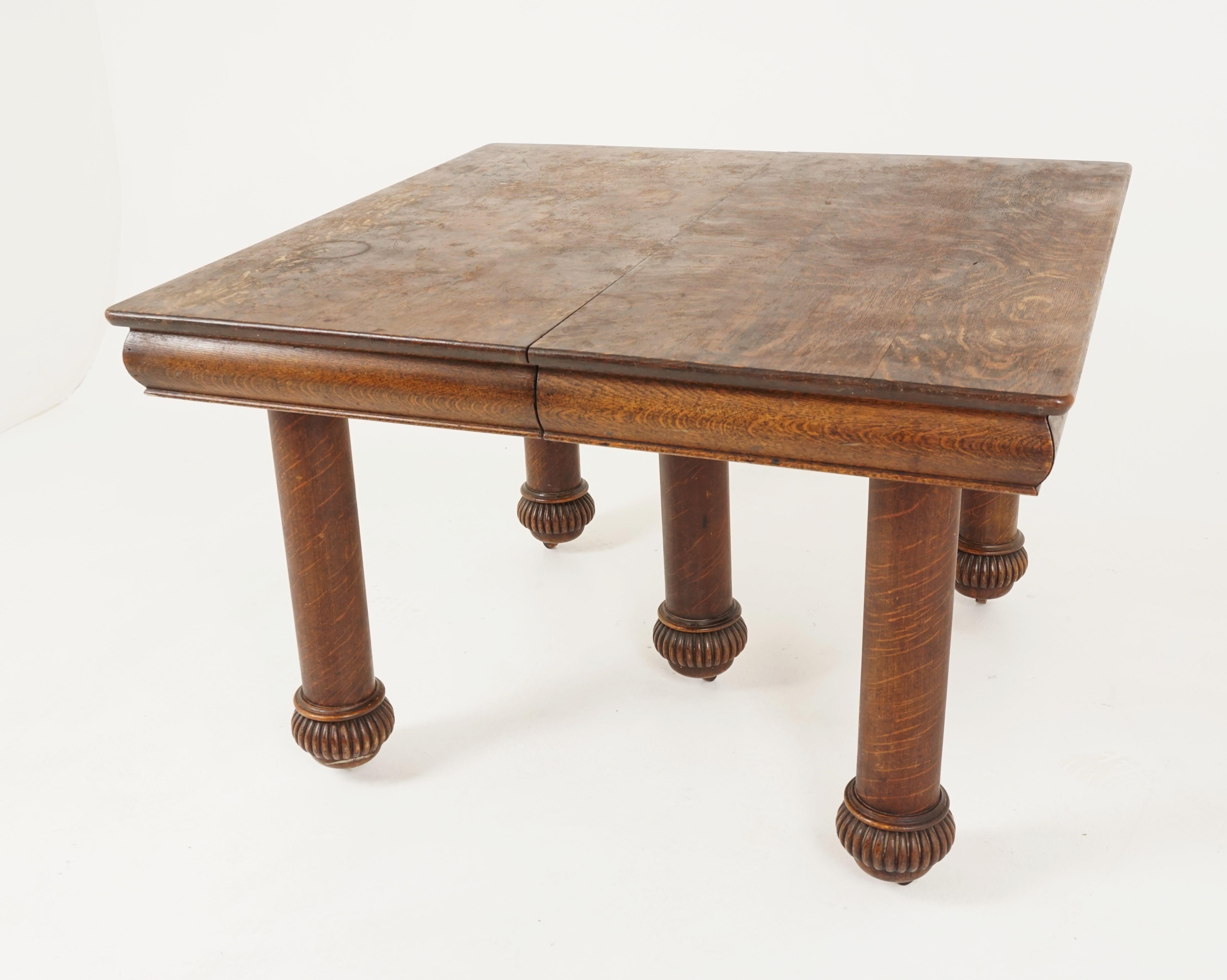 Antique tiger oak table, square dining table, 5 leaves, American 1910, B2480

American 1910
Solid tiger oak
Original finish
Square tiger oak top
Beveled underskirt
All standing on five turned legs with seeded base
All standing on original