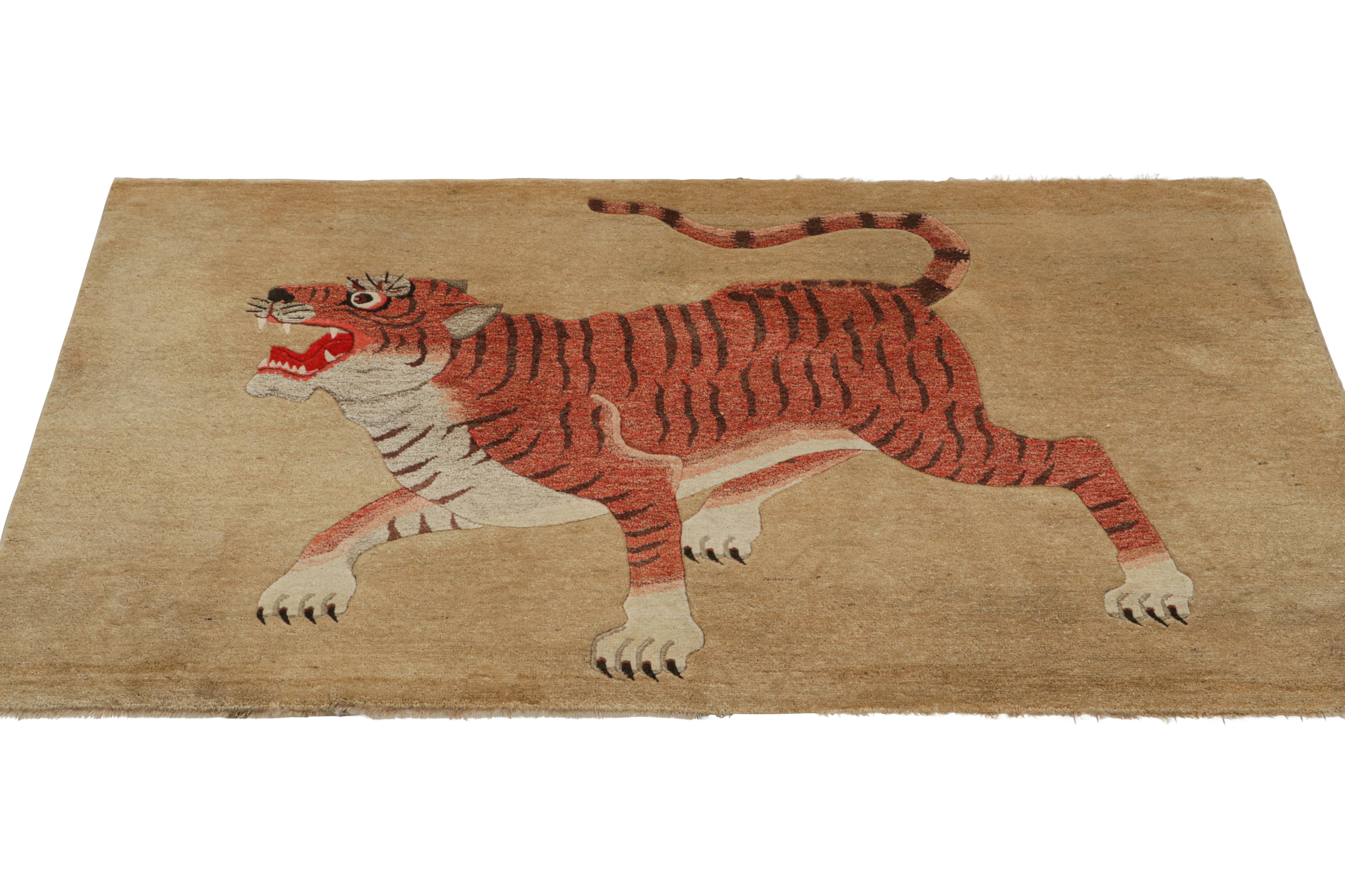 Hand-knotted in wool and originating from Germany circa 1920-1930, this 3x6 antique tiger runner rug is an exciting, rare new curation from the Rug & Kilim collection.

On the Design: 

Pictorial rugs are among some of the richest works of folk art