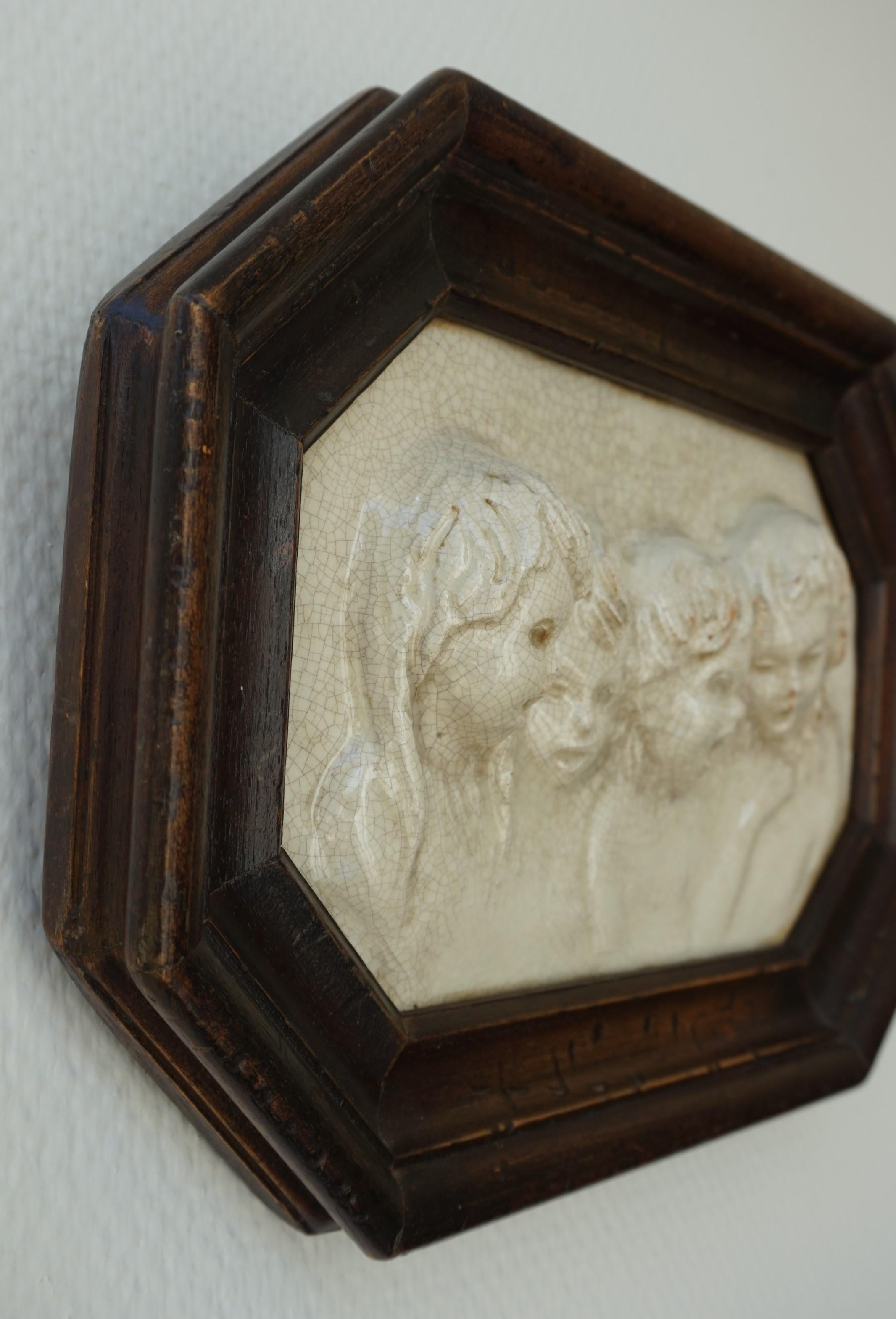 European Antique Tile in Frame with Devout Singing Angelic Children Sculptures in Relief For Sale