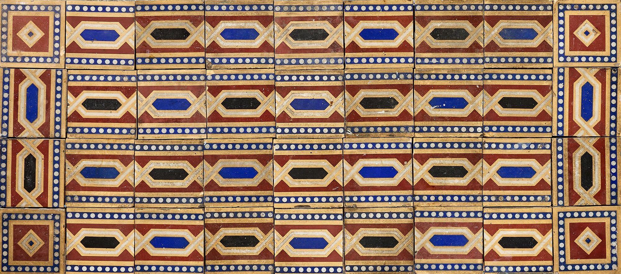A 36-piece set of 6-inch tiles by W. Godwin of Lugwardine in Herefordshire UK, perfect for use as an antique tile splashback, porch floor or fireplace hearth. Dating from the 19th century, these antique tiles together form an eye-catching geometric