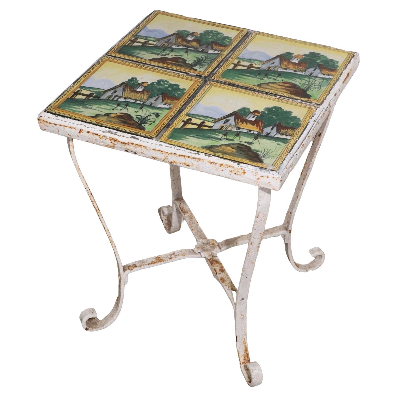Table de jardin, de patio et de véranda en fer forgé avec plateau en carreaux de faïence antique