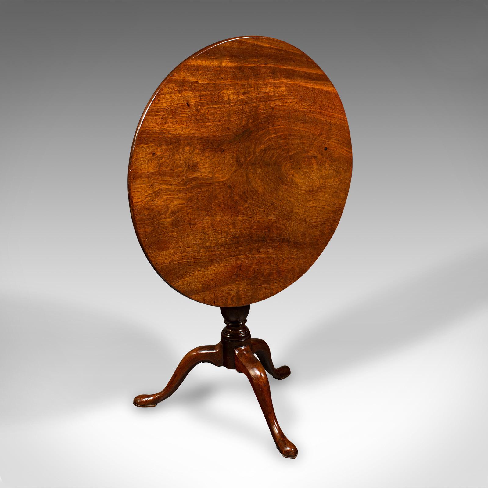 
This is an antique tilt-top table. An English, mahogany occasional table with birdcage mount, dating to the Georgian period, circa 1750.

Beautifully presented mid-Georgian example with fine figuring
Displays a desirable aged patina and in good