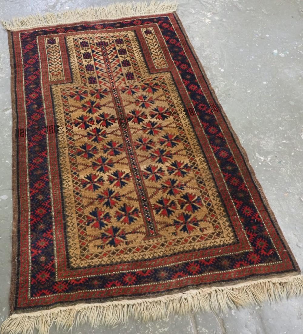 Antique Timuri / Baluch camel ground prayer rug with 'tree of life' design
Circa 1900

The rug is beautifully drawn and has excellent colour, the camel wool ground is very soft The rug retains the original end finishes at both ends The tree of life