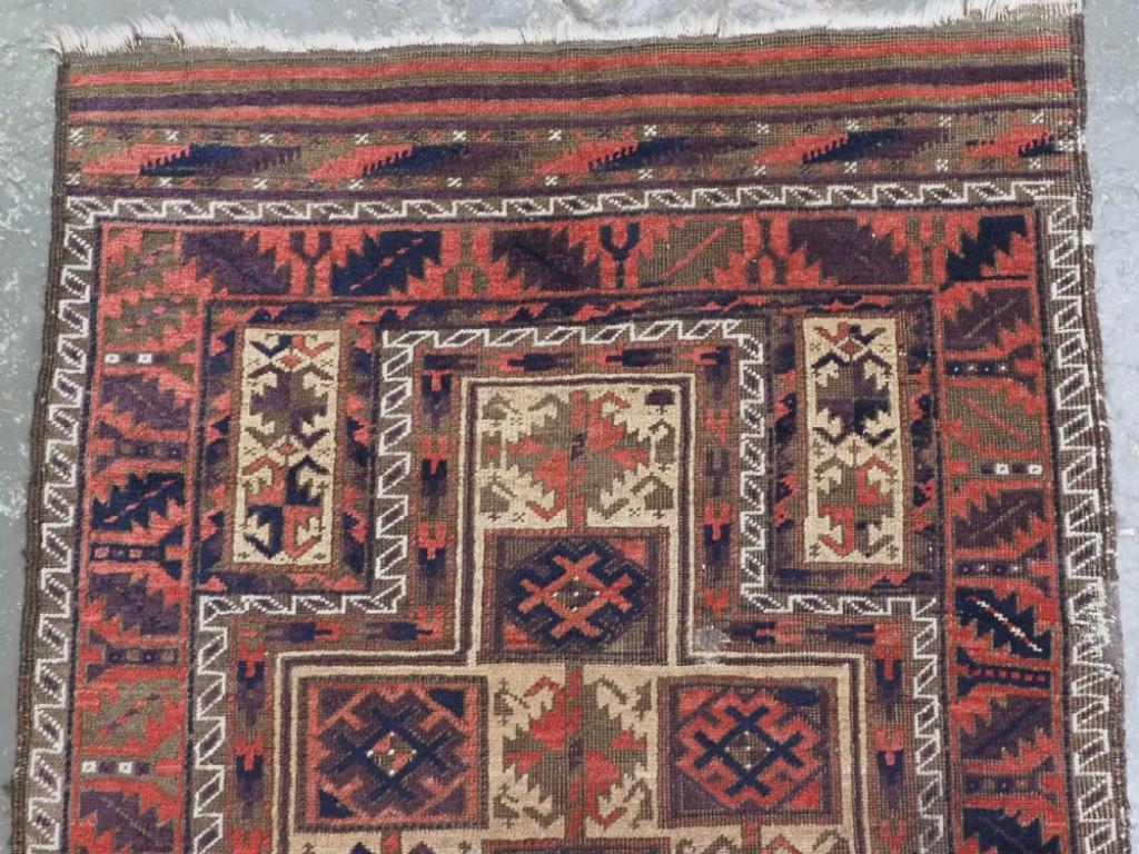 Antique Baluch prayer rug by the Yaqoub Khani sub tribe of the Timuri, with box design on a camel wool ground
Circa 1870 or earlier

This is a very unusual and possibly rare Timuri / Baluch prayer rug, the well known box design is on a camel ground
