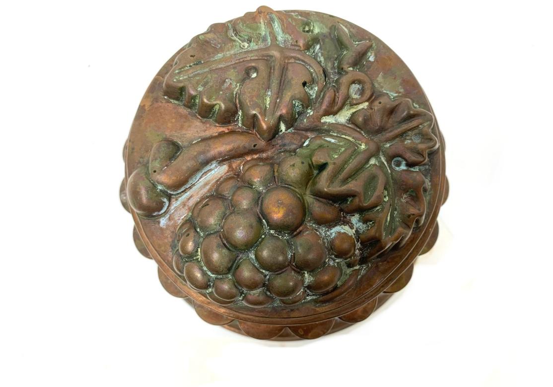 Folk Art Antique Tin Lined Copper Jelly Mold With Grape Design For Sale