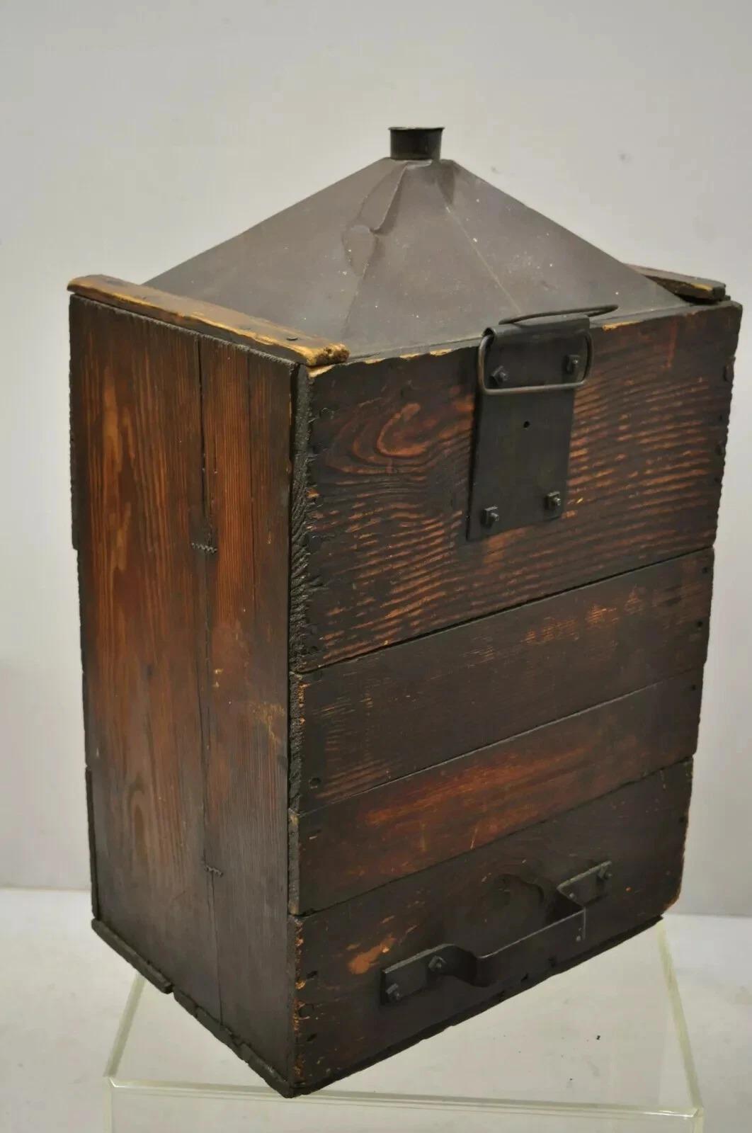 Antique Rustic Farmhouse Tin Metal Export Transport 5 Gallon Canister Container with Wooden Case. Item features a solid wood frame, galvanized tin metal container, remnants of cork to mouth of canister, very nice antique item. Believed to be a 5