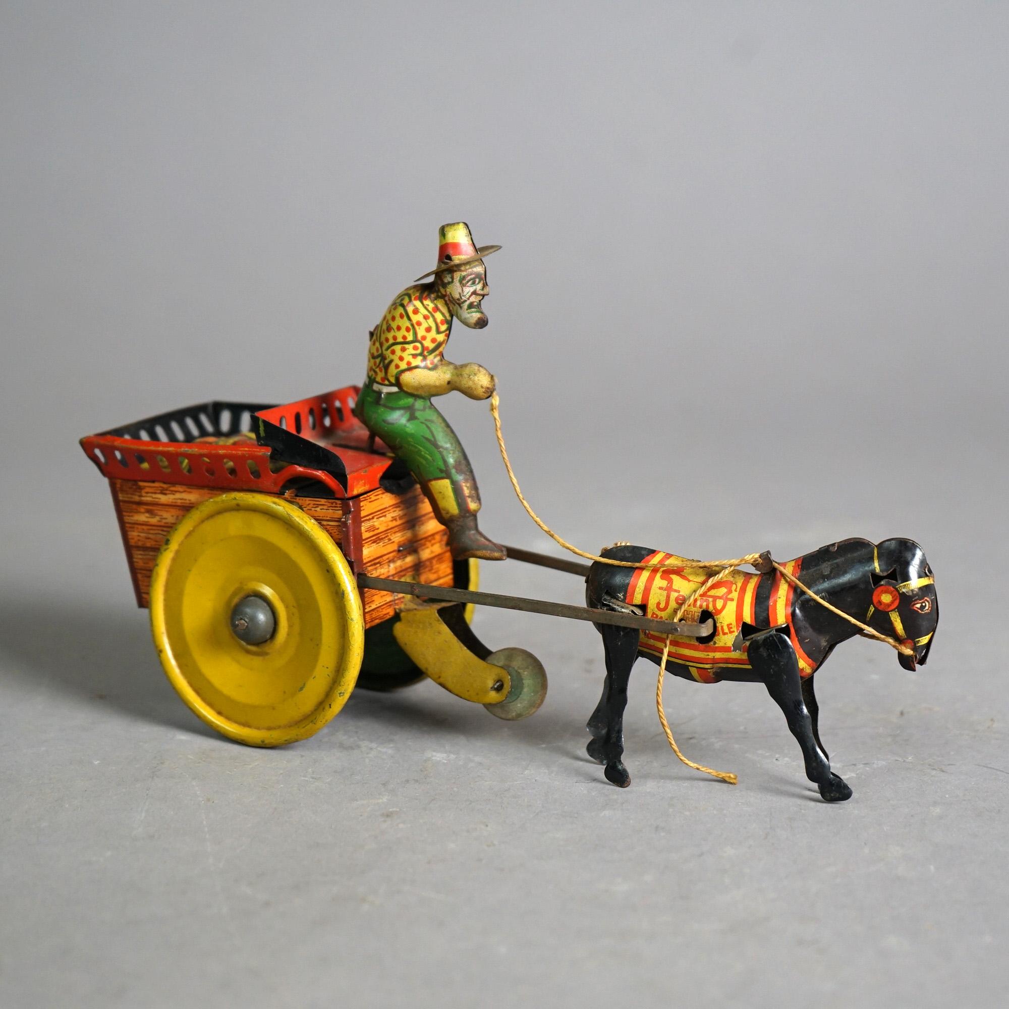 Painted Antique Tin Wind-Up Toy by The Ferdinand Strauss Corp; Man, Mule & Wagon; c1920