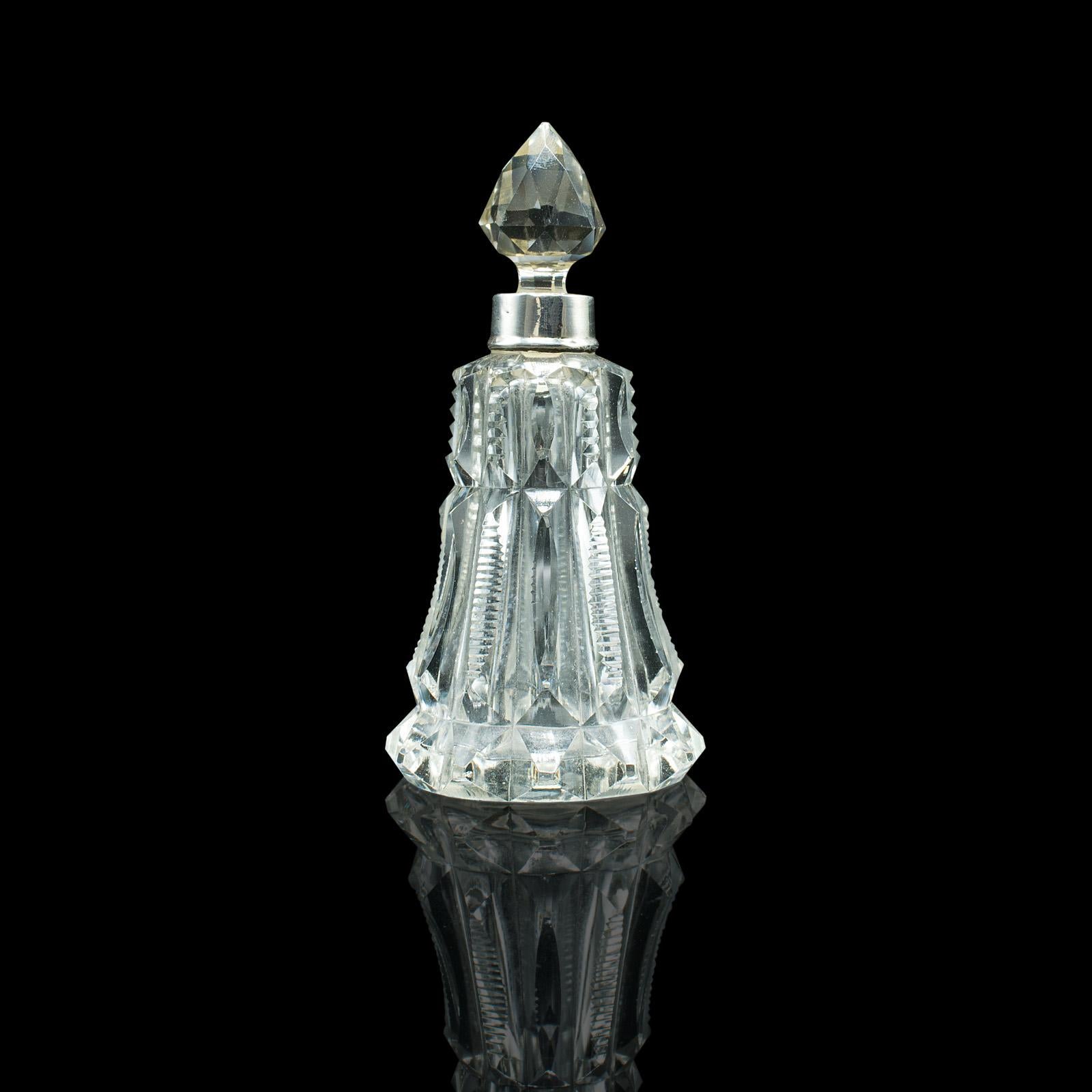 This is an antique tipple decanter. An English, glass and silver collared small spirit vessel, hallmarked to the early 20th century, dated 1922.

Tactile and petite - a pleasingly finished tipple decanter
Displays a desirable aged patina