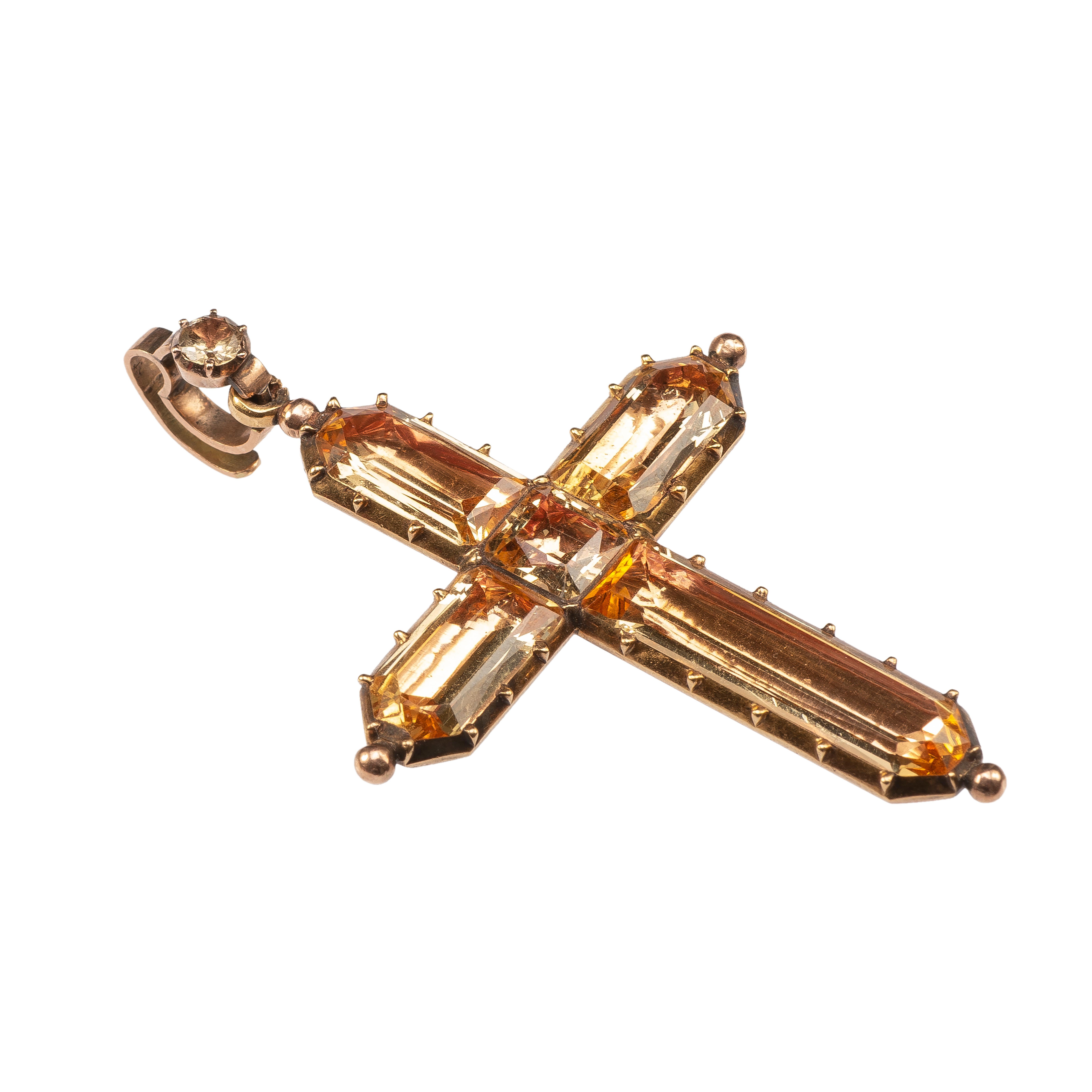 Topaz Cross Pendant  
Probably England, c. 1820  
Gold, silver, Imperial topaz 
Weight 12.9 gr.; Dimensions 64.9 × 41.4 mm.  

A gold cross with plain back and beveled edges, facetted triangular ends with globules. The facetted stones are inset, the