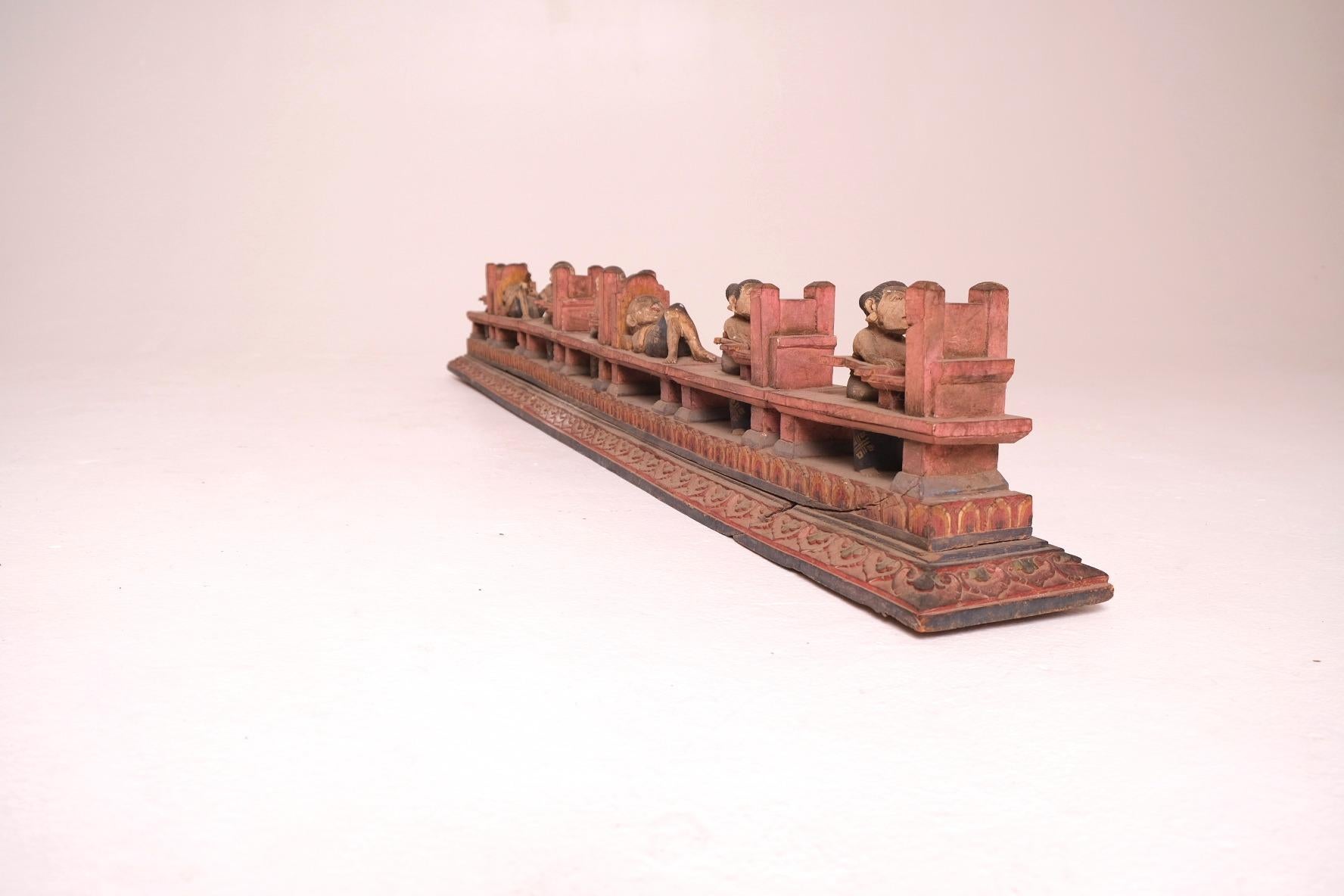 Paint Antique Toraja Soul Boat Sculpture with Eight Carved Figures, Indonesia For Sale