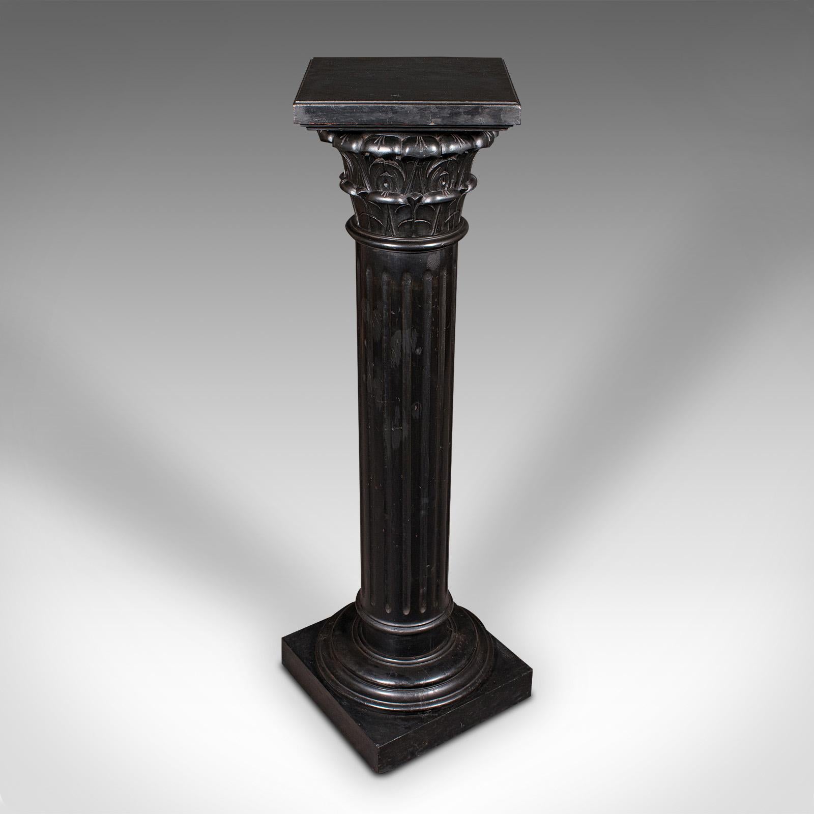 
This is an antique torchère. An English, ebonised pine museum stand, jardiniere column or bust plinth, dating to the Victorian period, circa 1900.

Classically appealing torchère stand in the Corinthian order
Displays a desirable aged patina