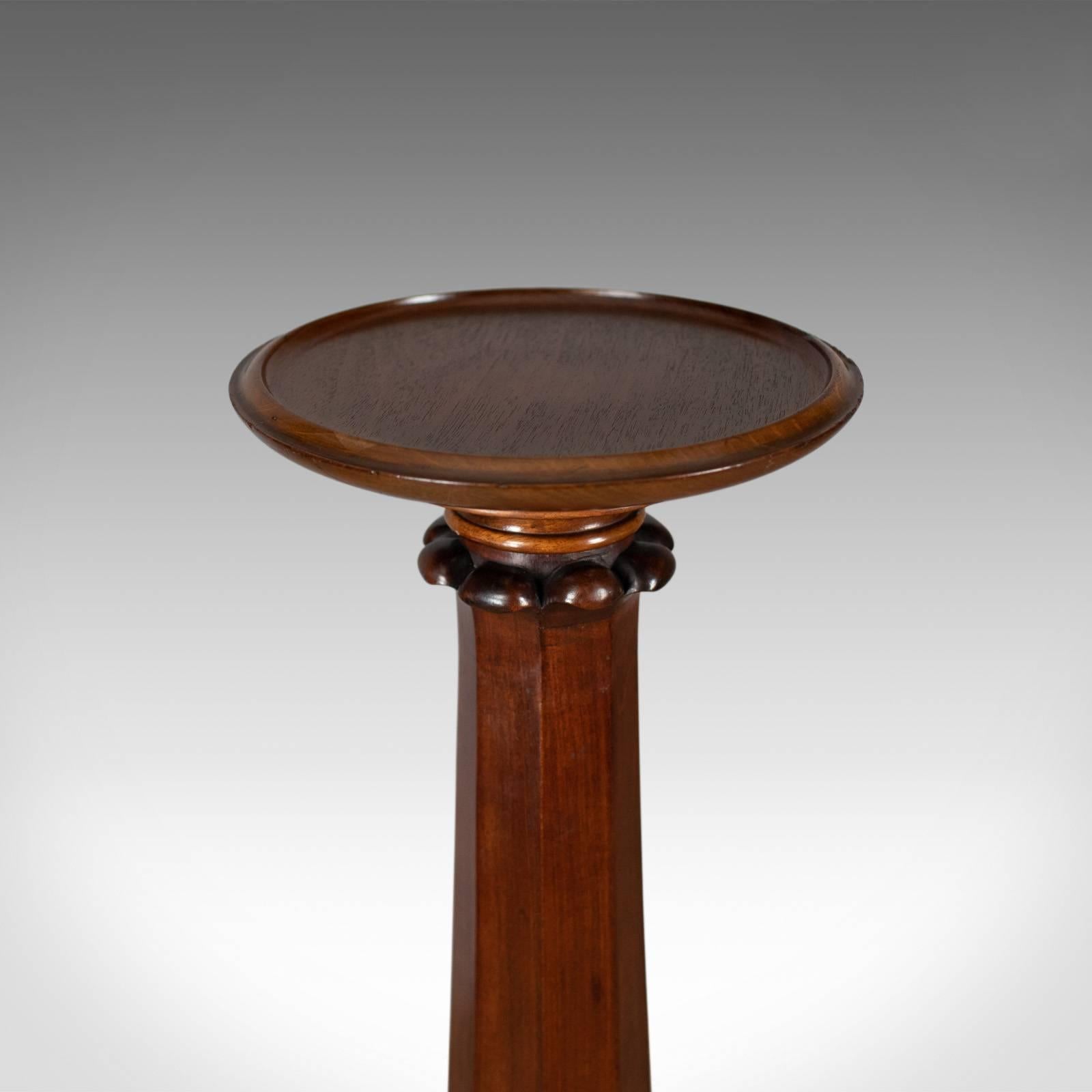 This is an antique torchere, an English, William IV plant stand in mahogany dating to circa 1835.

Attractive color and graining to the solid mahogany
Of quality craftsmanship with a desirable aged patina
Offering a weighty, solid, robust and