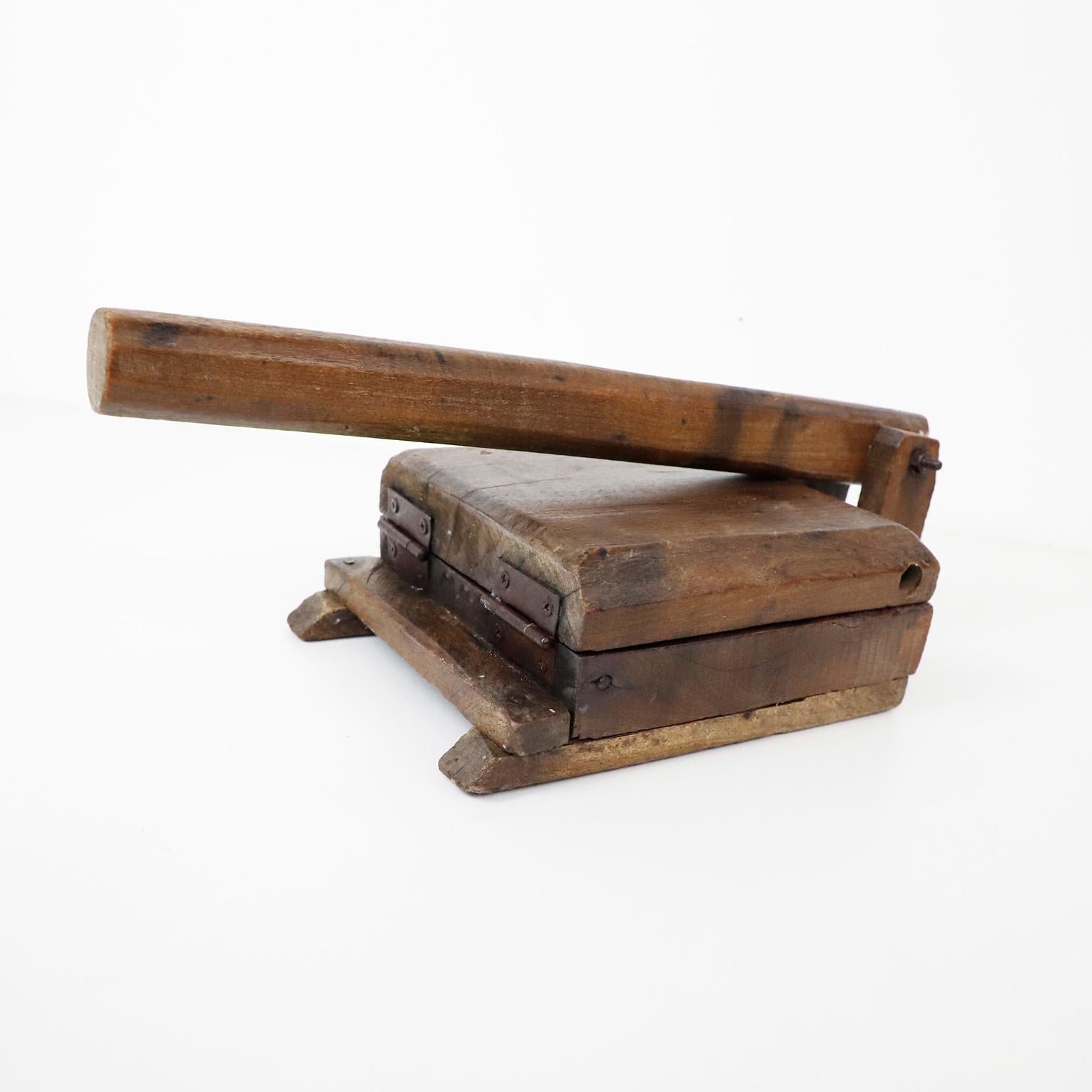 We offer this antique tortilla press maker in mesquite wood, circa 1950.