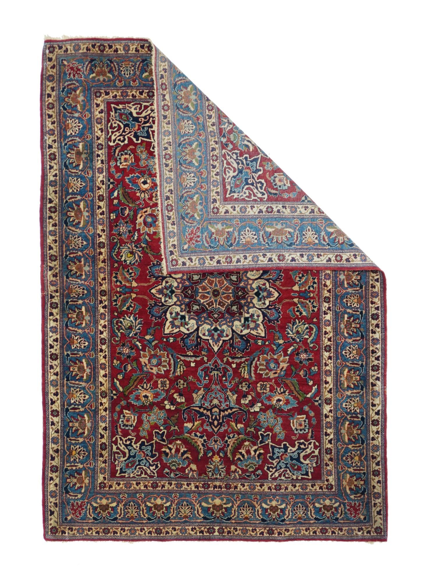This very finely woven central Persian town small scatter shows a rich palette starting with the saturated red field which support a central ivory round medallion with eight spadiform points. Cerulean blue outlines the pendants, navy pointed