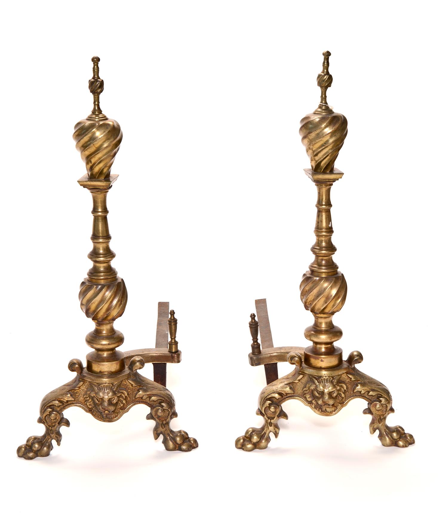 Stunning pair of 19th century European brass andirons. Intricately decorated feet & legs with lion motif with twisted brass finials.
Available for limited time, after which this will no longer be on this platform.