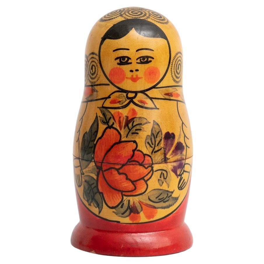 Traditional Russian 'Matrioska' doll wooden figure. Hand-painted.

Made by unknown manufacturer in Russia, circa 1960.

In original condition, with minor wear consistent with age and use, preserving a beautiful