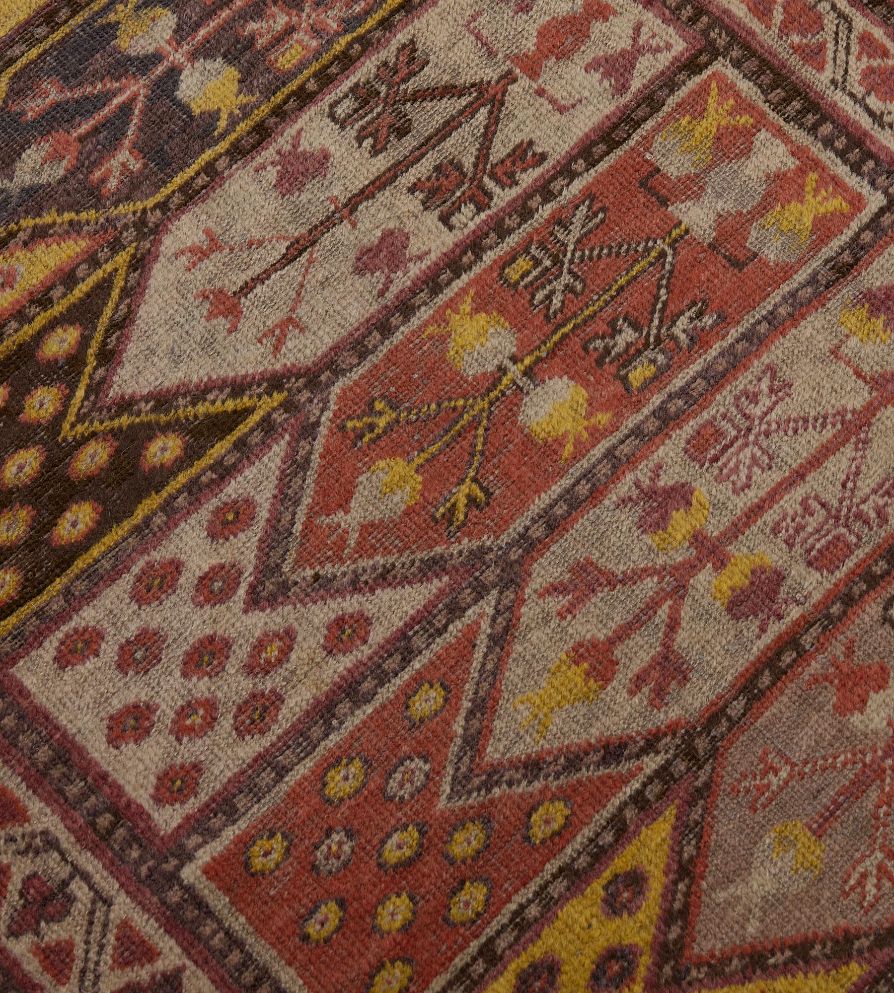 East Turkestani Antique Traditional Hand-Woven Wool Paneled Khotan Runner For Sale