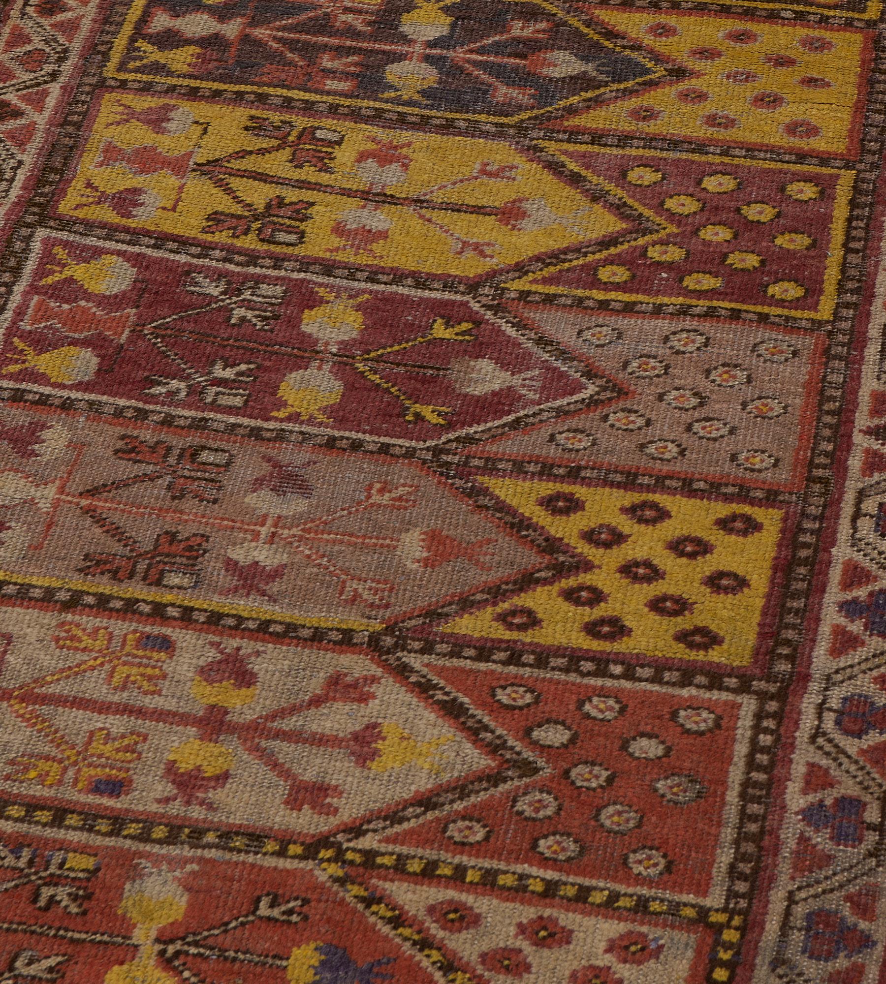 Antique Traditional Hand-Woven Wool Paneled Khotan Runner In Good Condition For Sale In West Hollywood, CA