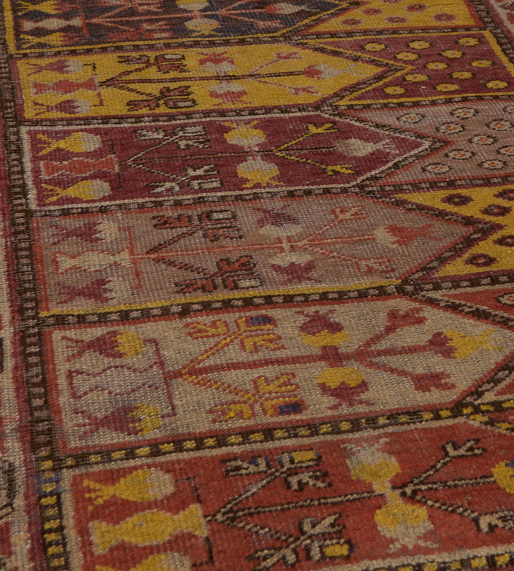 20th Century Antique Traditional Hand-Woven Wool Paneled Khotan Runner For Sale
