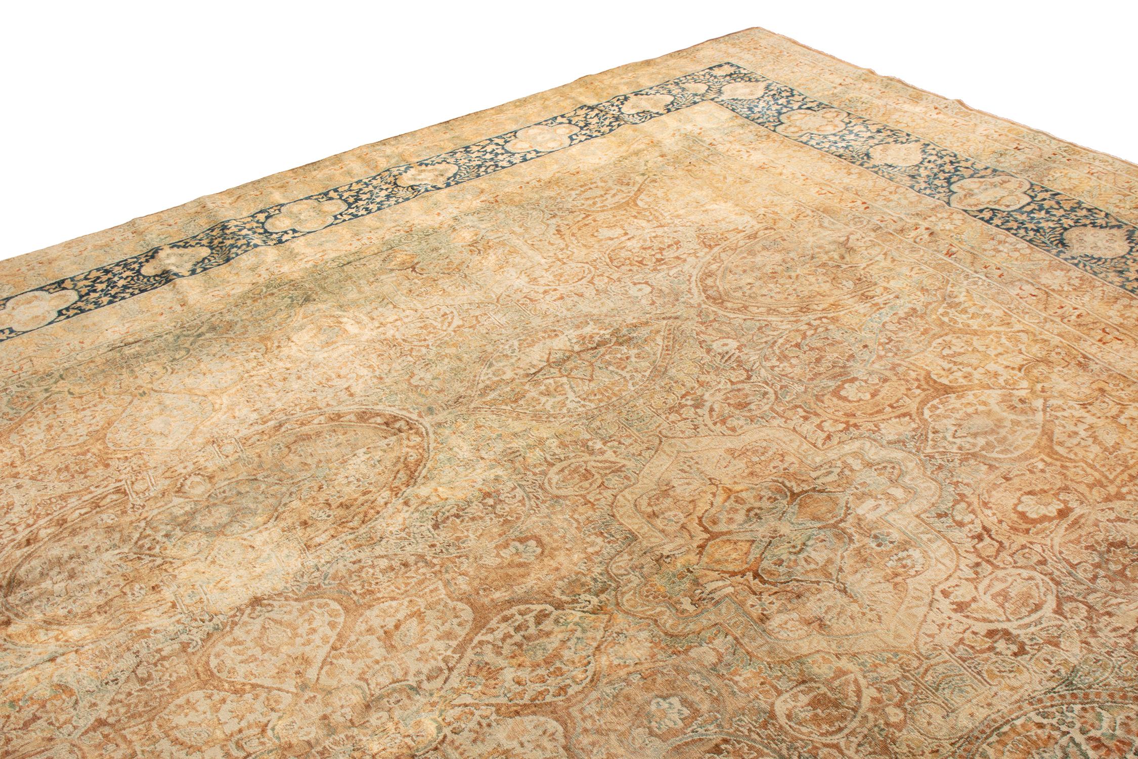 This antique traditional Kerman Lavar floral rug has diverse colors in well-aged wool pile. Originating circa 1910-1920, the natural dye is lightly distressed in frost blue, white, and rustic bronze, though the rustic accent only brings out the