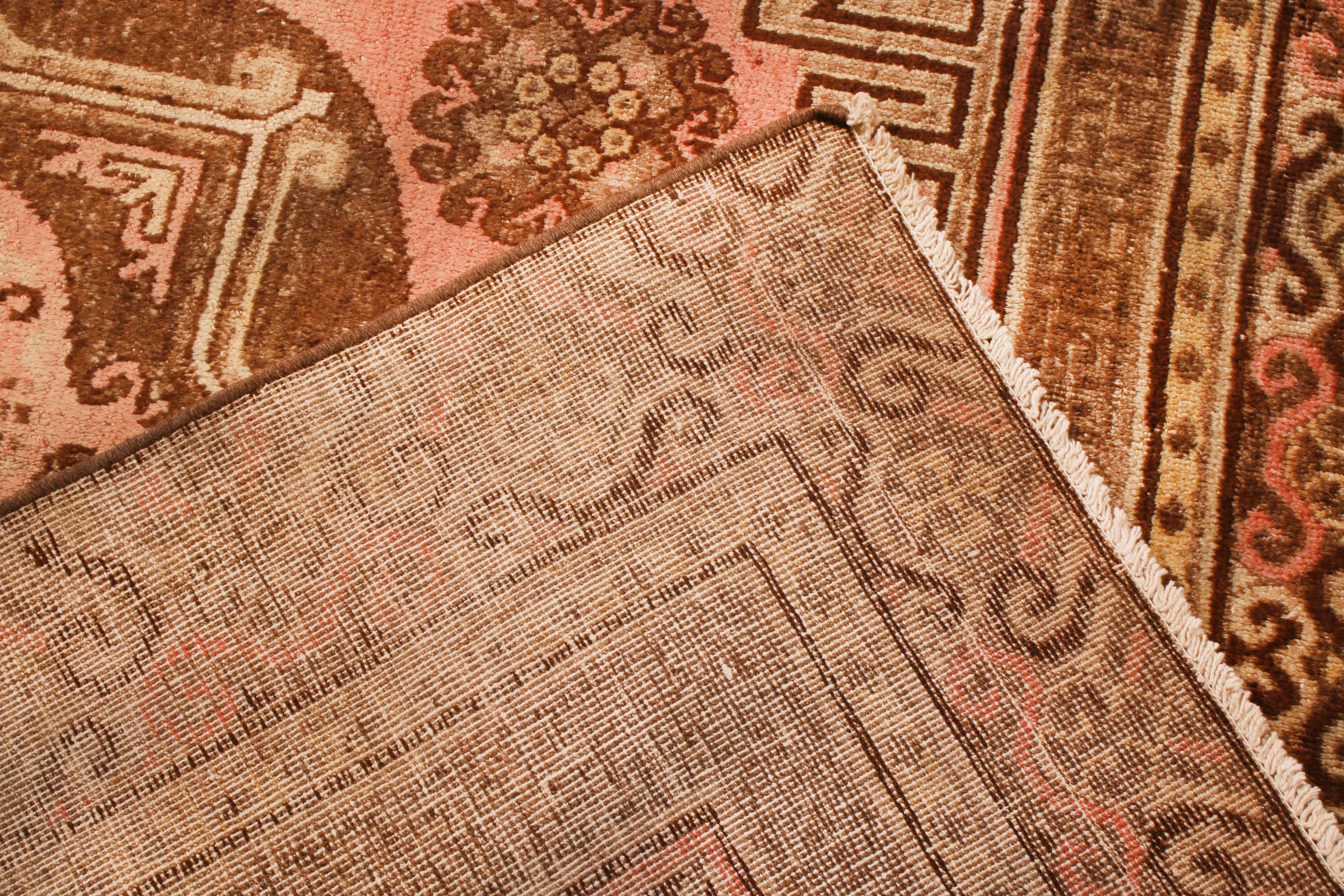 Antique Traditional Khotan Pink and Brown Wool Rug with Medallions In Good Condition In Long Island City, NY