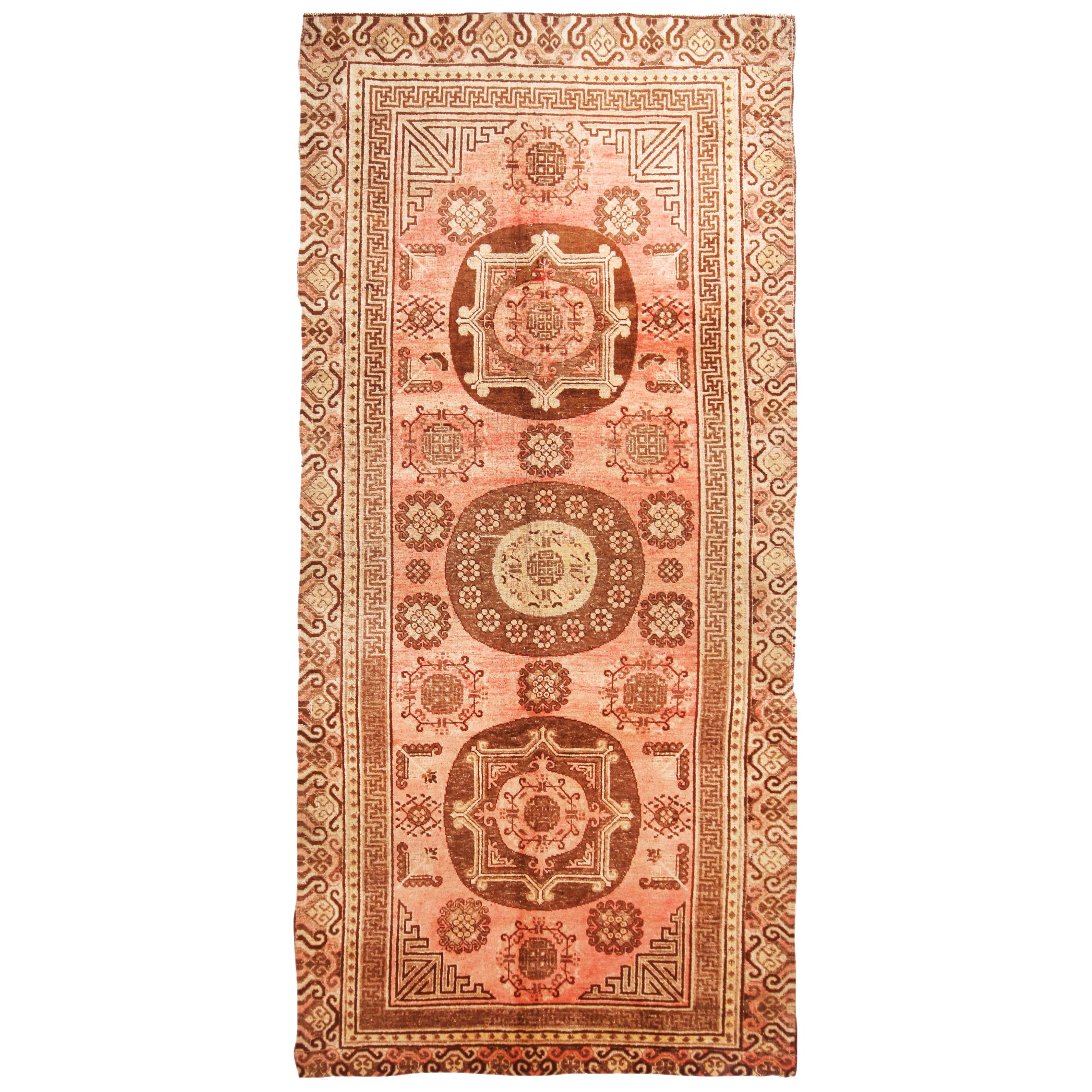Antique Traditional Khotan Pink and Brown Wool Rug with Medallions
