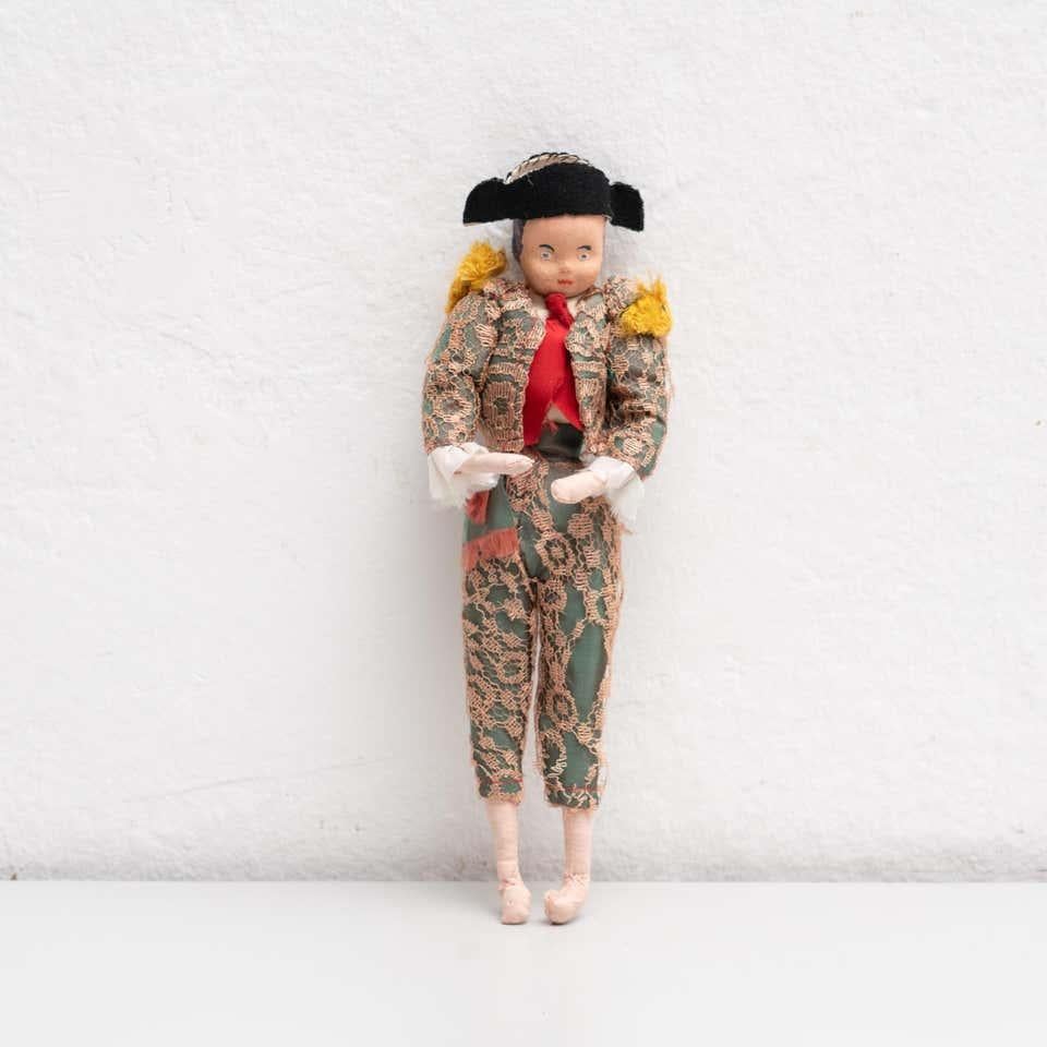 Antique early 20th century hand painted rag doll of a traditional Spanish dressed with traditional bullfighter 'torero' costume. 

Manufactured circa 1920 in Spain.

In original condition, with minor wear consistent with age and use, preserving a